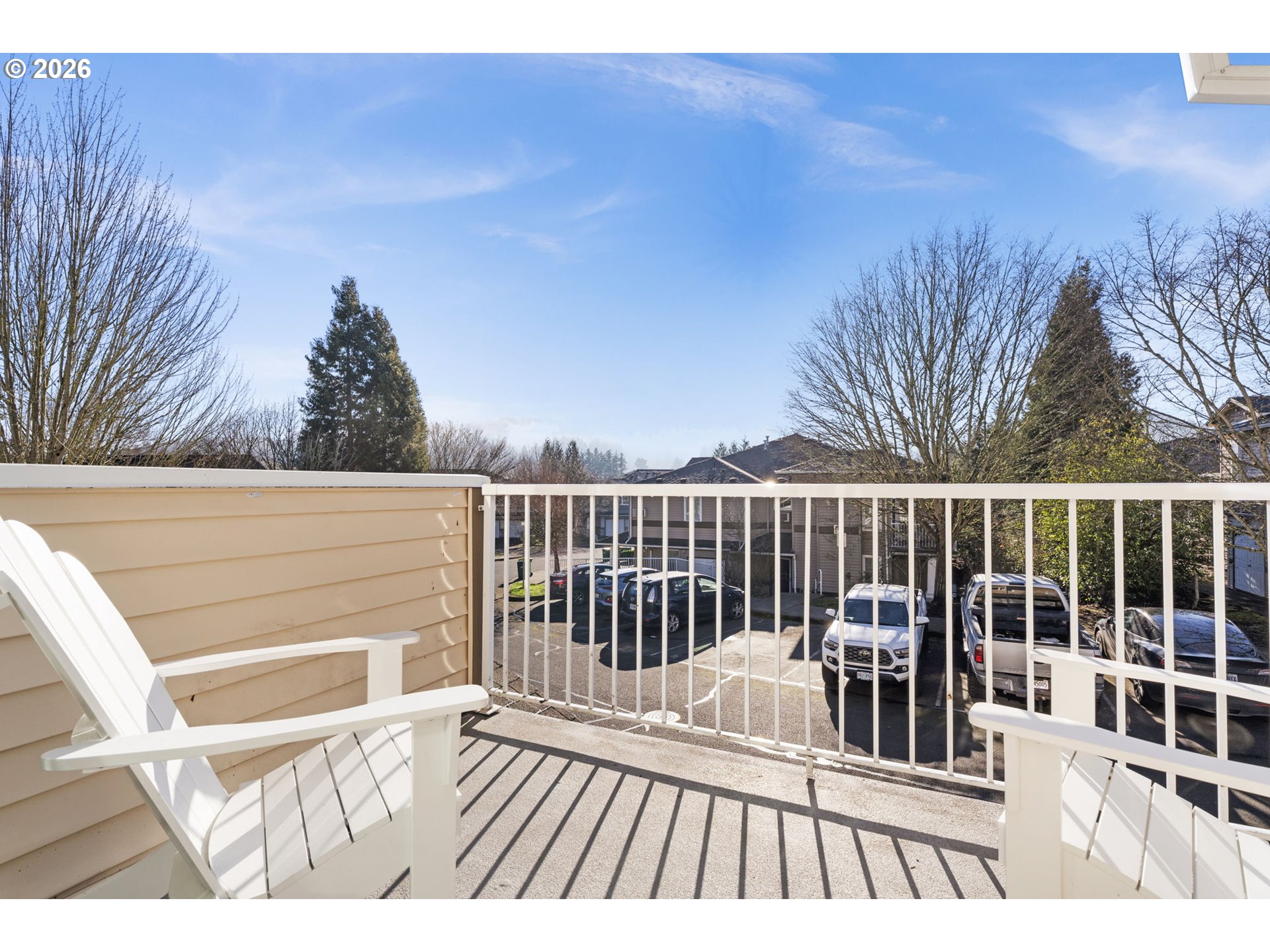 14705 Southwest Sandhill Loop, Unit 202 Beaverton, OR 97007 - Photo 17 of 24 a view of a black and white wooden fence