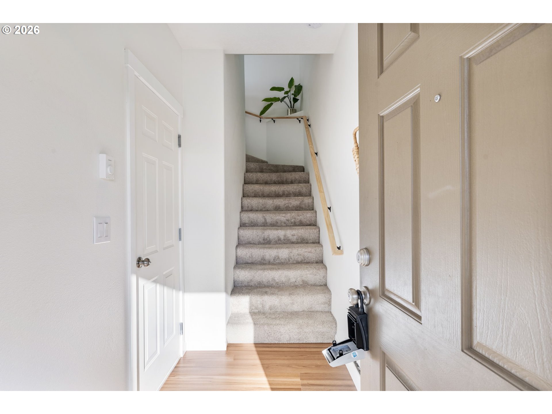 14705 Southwest Sandhill Loop, Unit 202 Beaverton, OR 97007 - Photo 2 of 24 a view of entryway with wooden floor