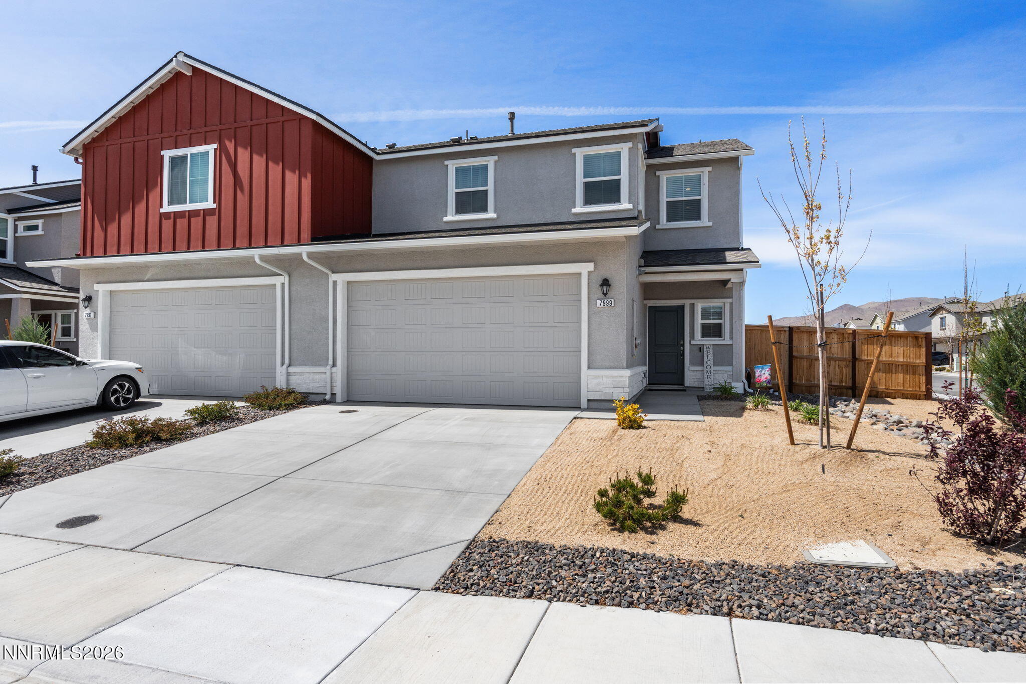7999 Majorite Way Sparks, NV 89436 - Photo 1 of 26 a backyard of a house with barbeque oven and outdoor seating