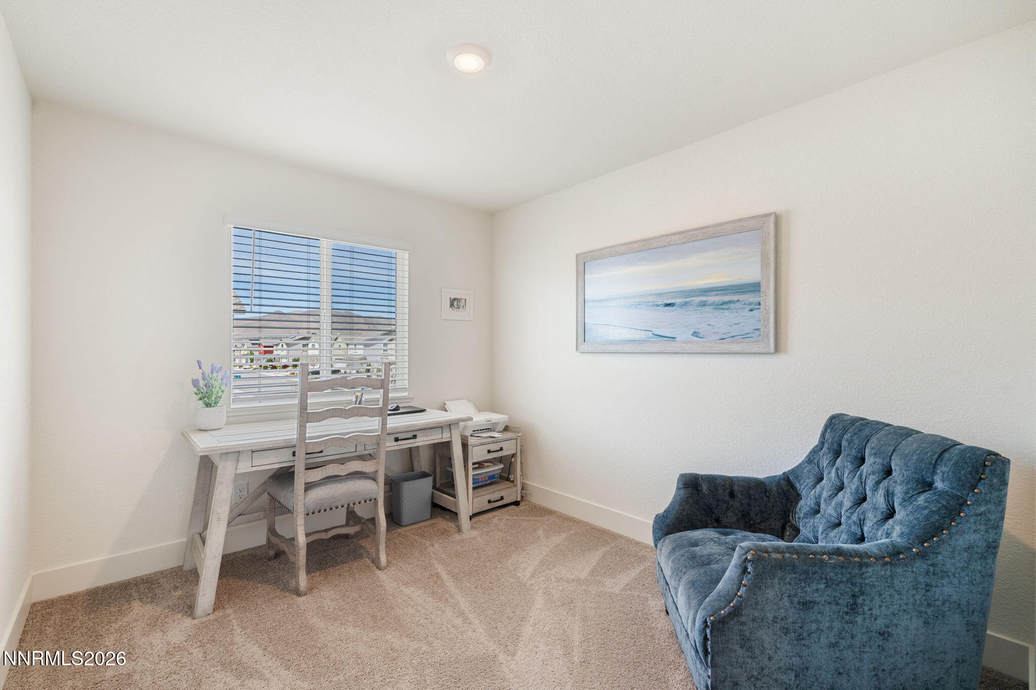 7999 Majorite Way Sparks, NV 89436 - Photo 20 of 26 a livingroom with furniture and window