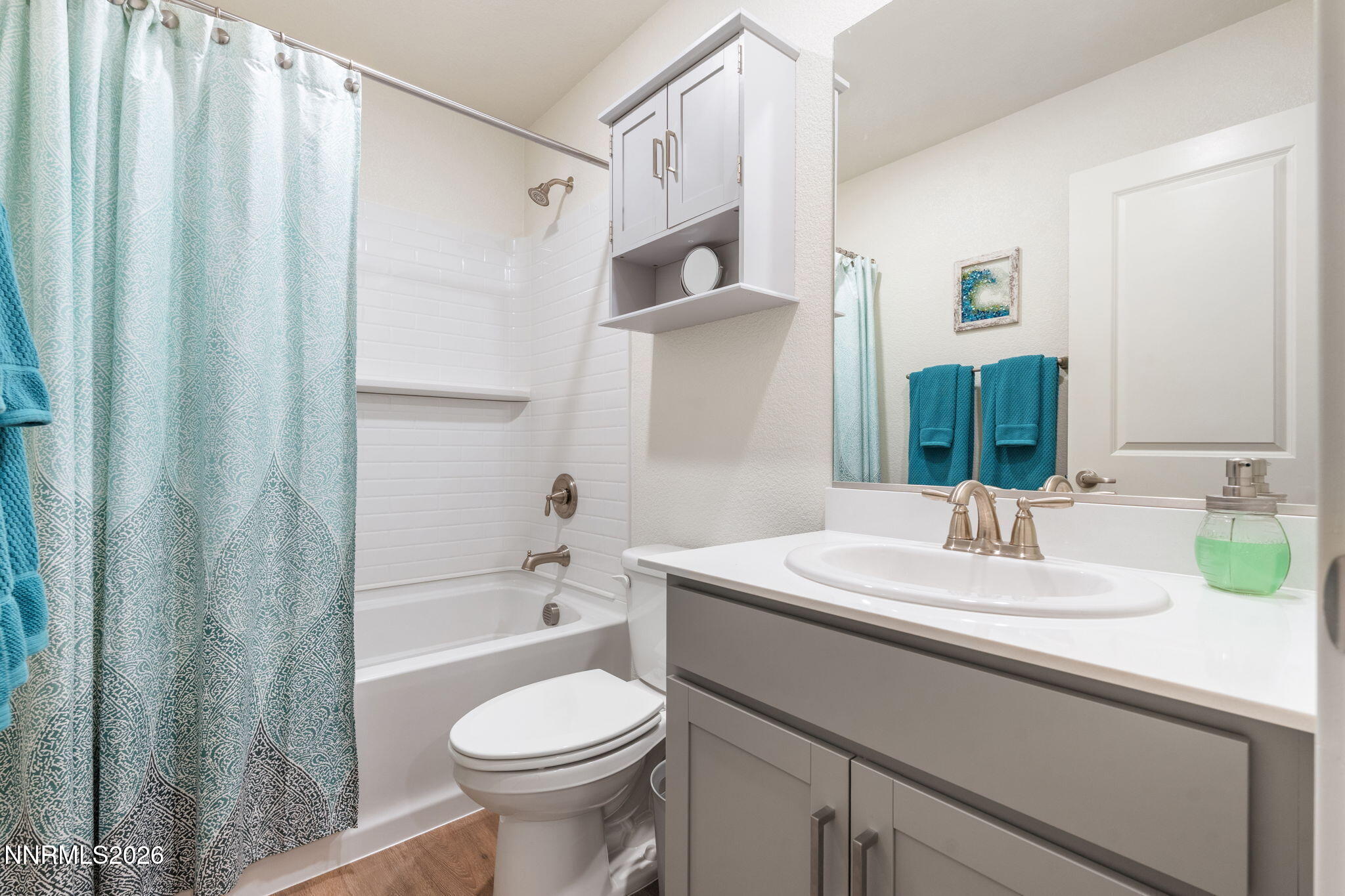 7999 Majorite Way Sparks, NV 89436 - Photo 21 of 26 a bathroom with a sink a toilet and shower