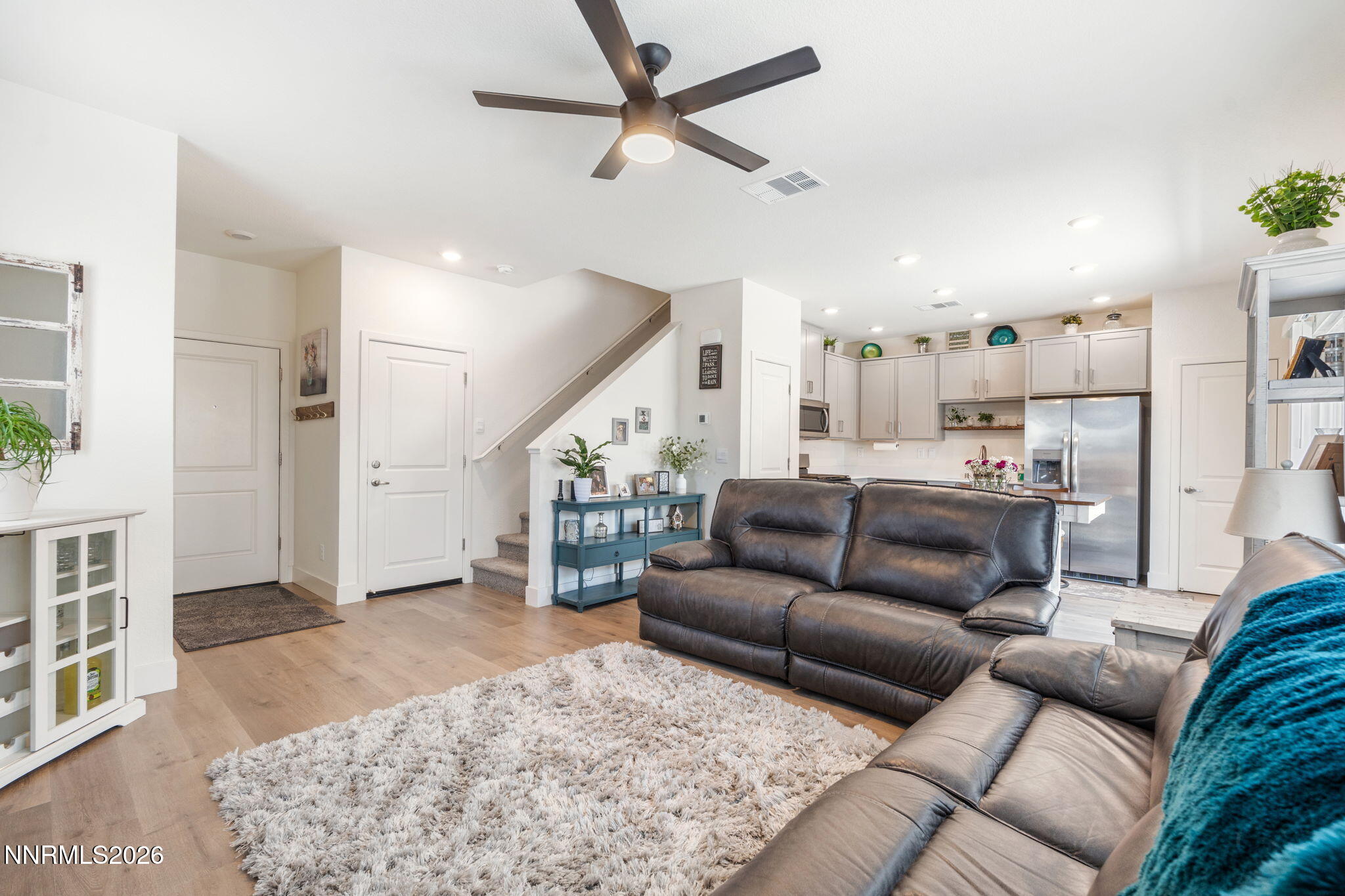 7999 Majorite Way Sparks, NV 89436 - Photo 7 of 26 a living room with furniture and a rug