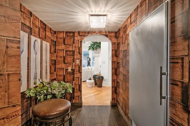 a room with furniture and a potted plant