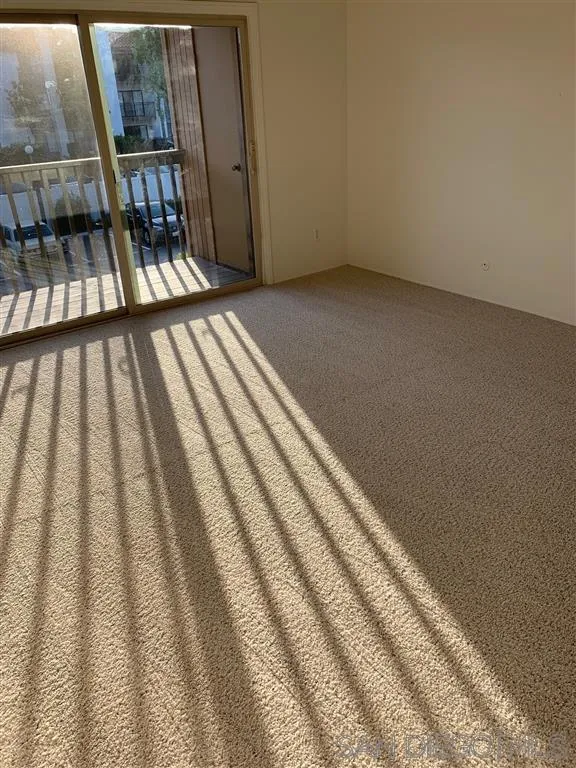 6064 Rancho Mission Road, Unit 448 San Diego, CA 92108 - Photo 12 of 15 a view of outdoor space with wooden floor and stairs