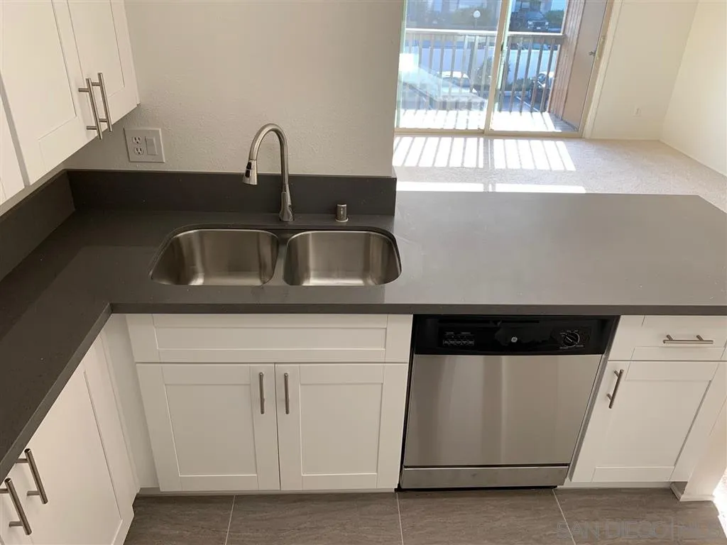6064 Rancho Mission Road, Unit 448 San Diego, CA 92108 - Photo 4 of 15 a close view of sink and tap