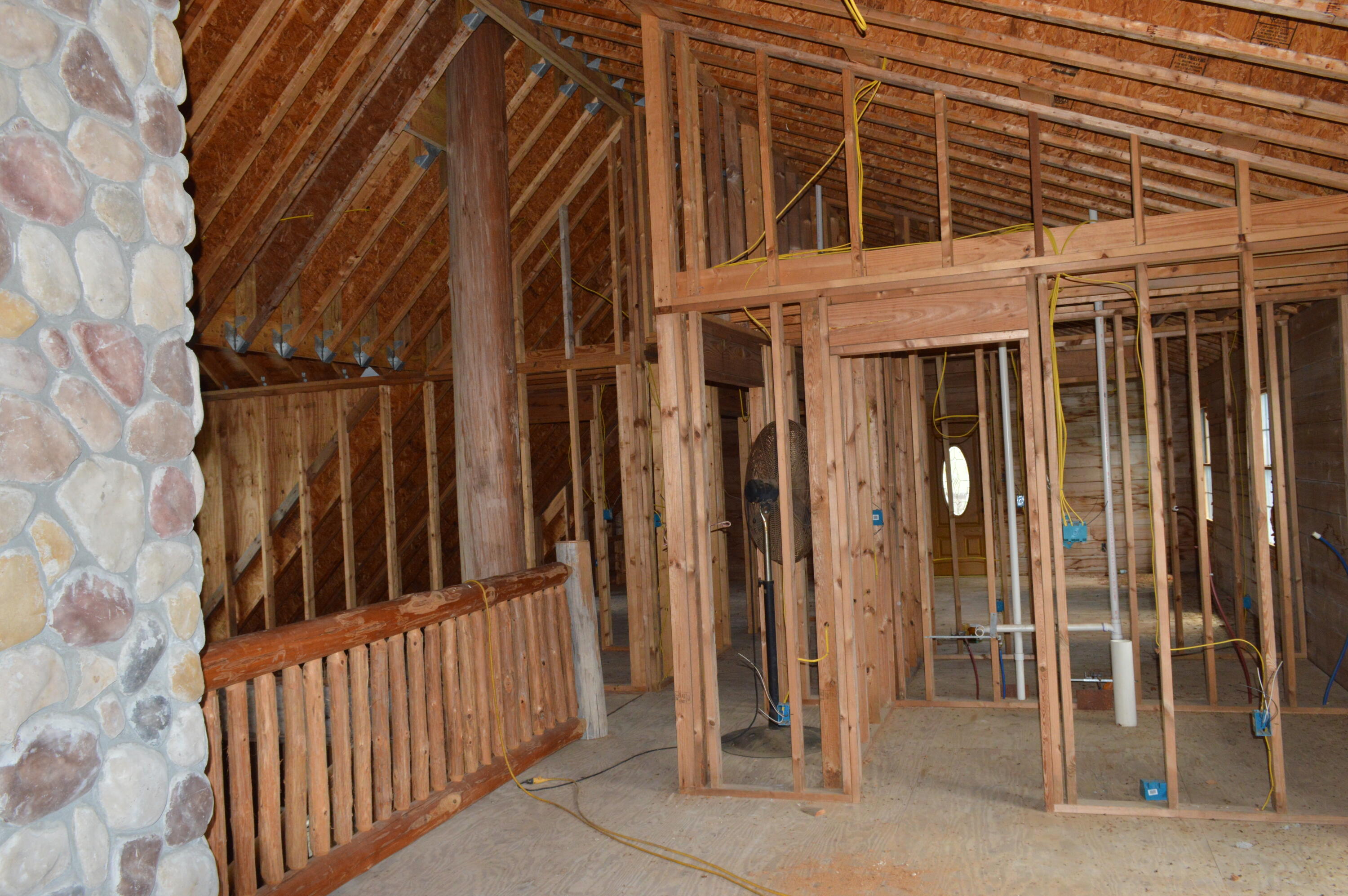 902 Bailie Road Crestview, FL 32539 - Photo 16 of 34 a view of a house with a door and wooden fence
