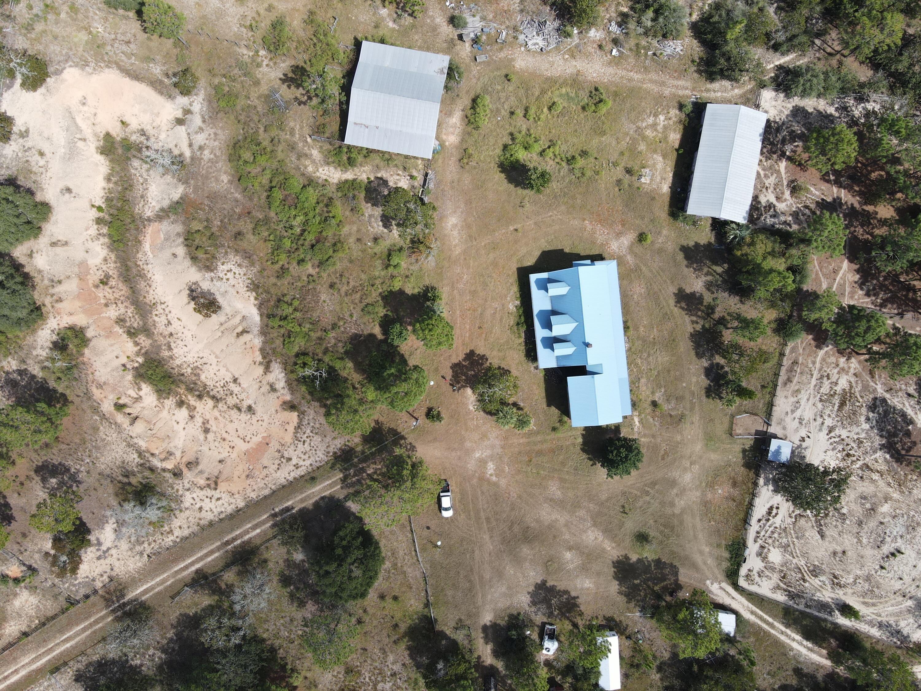 902 Bailie Road Crestview, FL 32539 - Photo 28 of 34 an aerial view of residential house with outdoor space