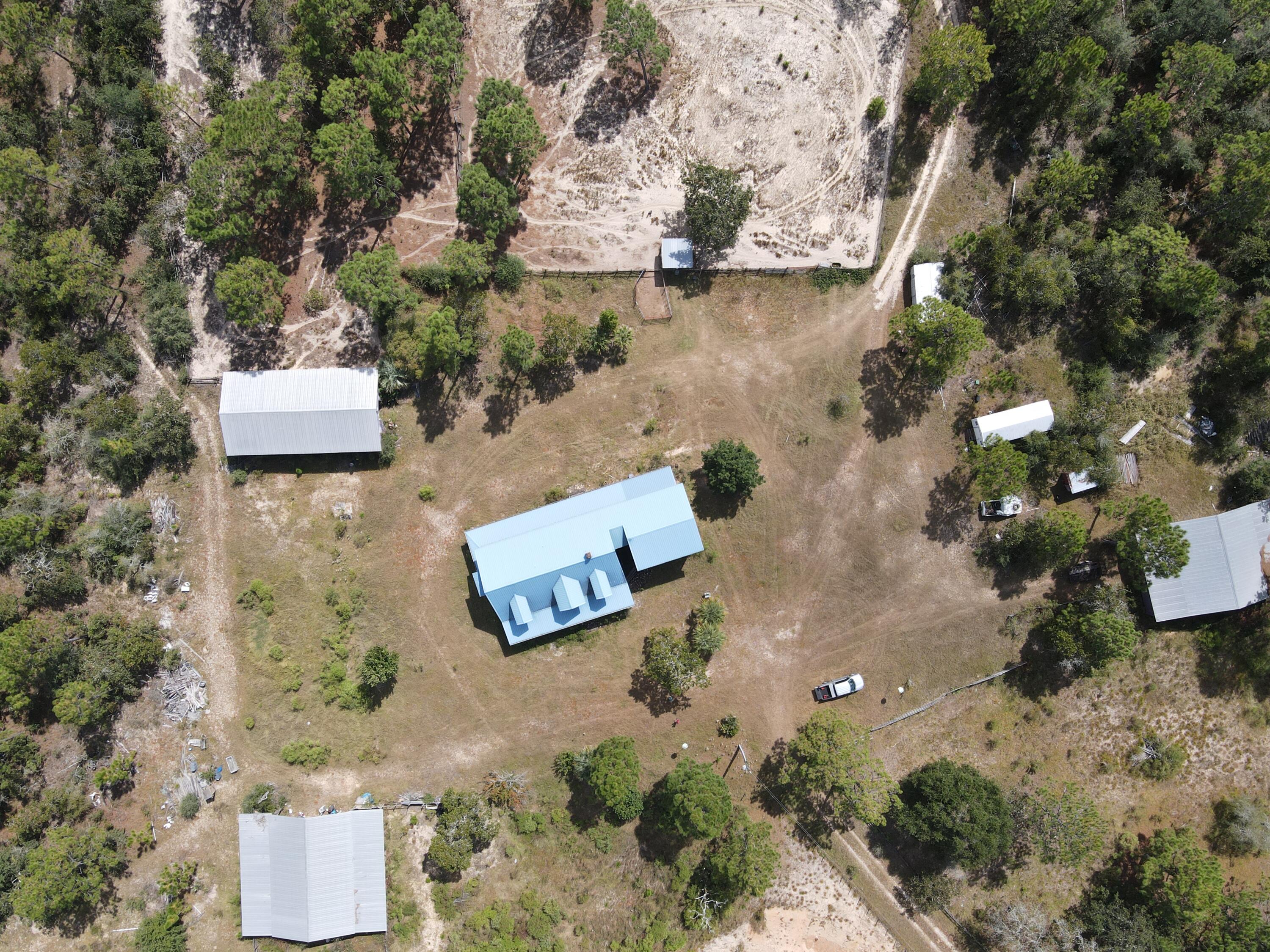 902 Bailie Road Crestview, FL 32539 - Photo 29 of 34 an aerial view of residential house with outdoor space