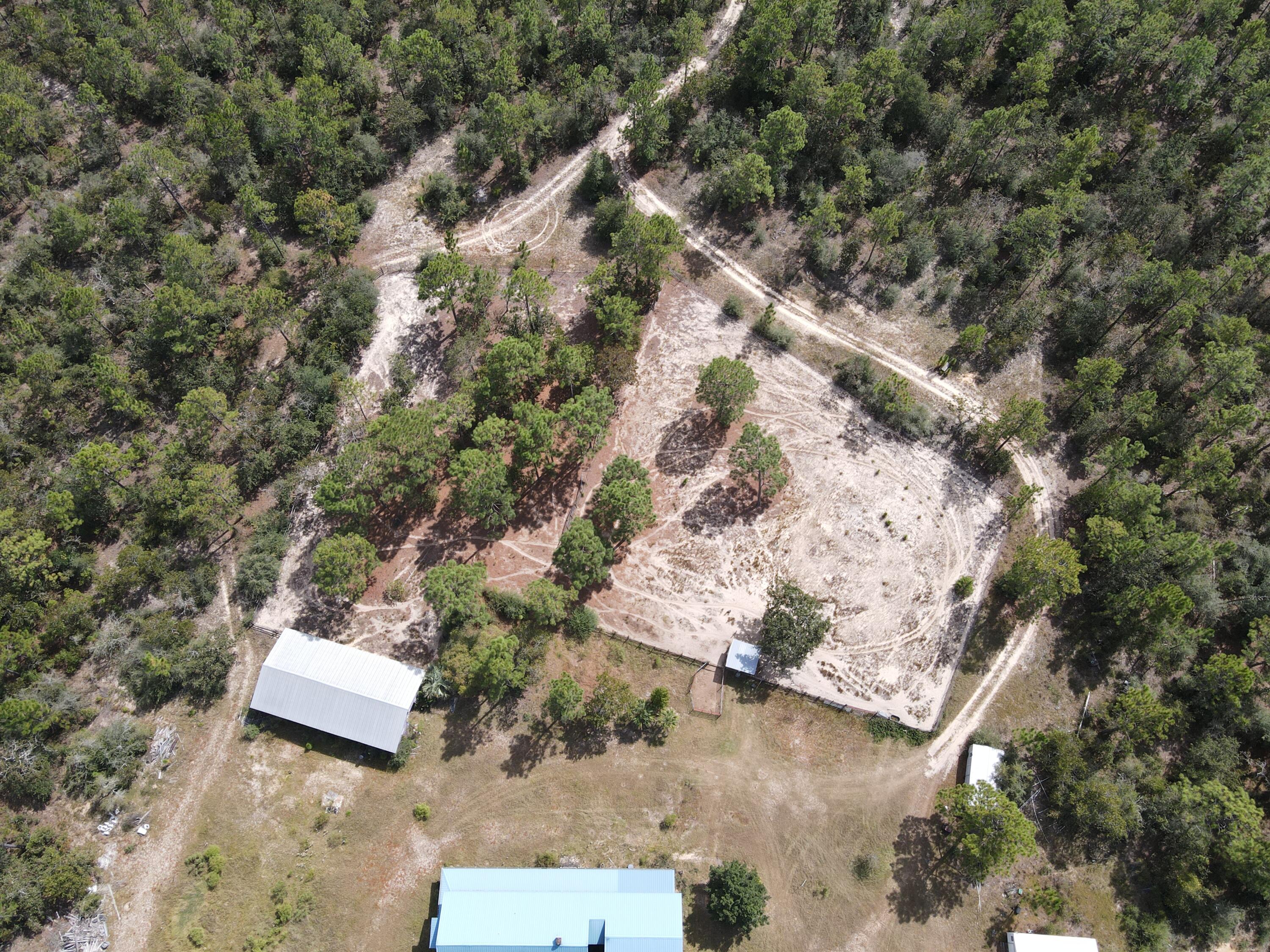 902 Bailie Road Crestview, FL 32539 - Photo 32 of 34 an aerial view of a house with a yard