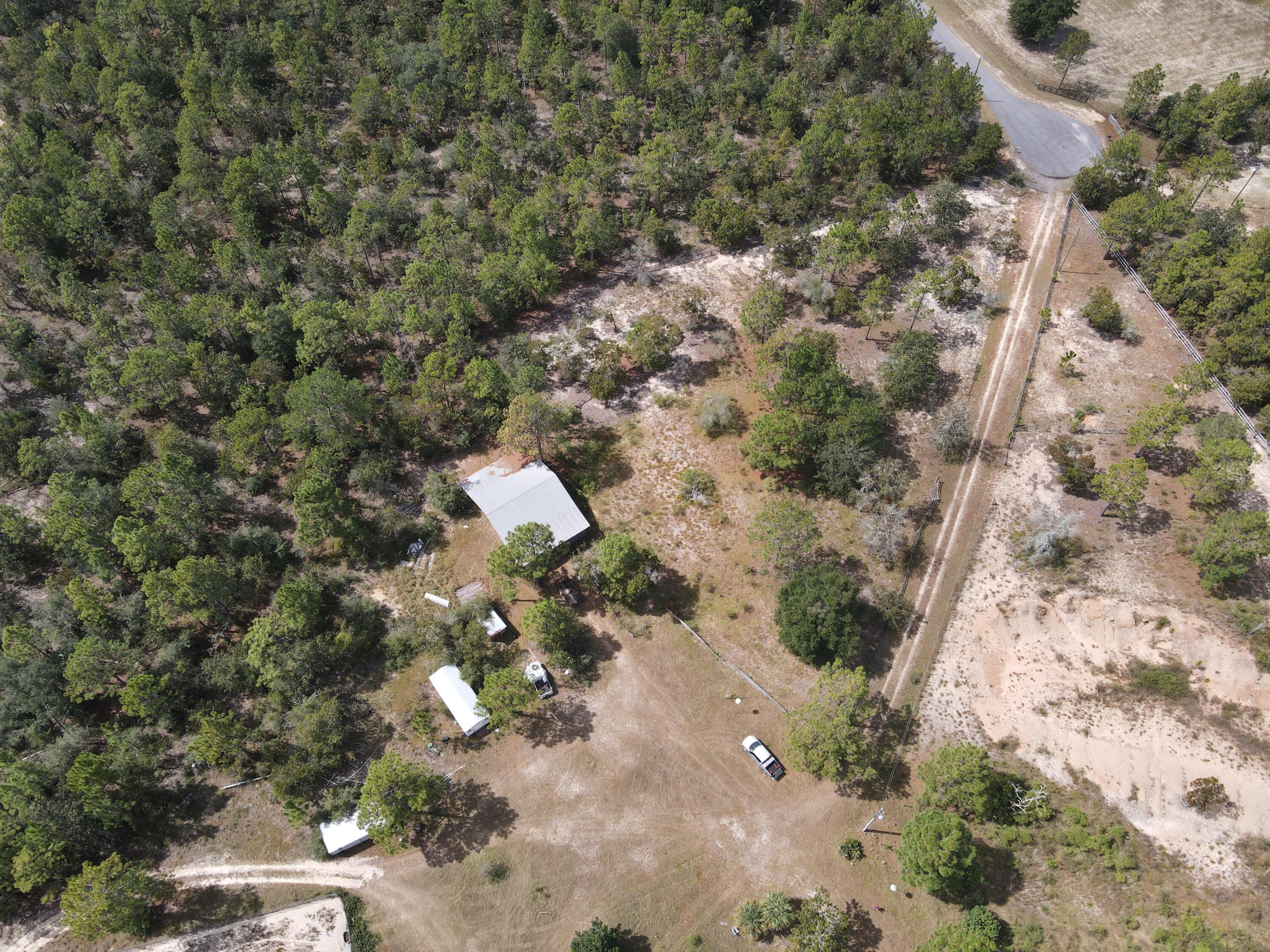 902 Bailie Road Crestview, FL 32539 - Photo 33 of 34 a aerial view of a house with a yard