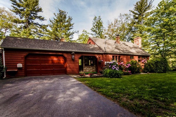 131 Shore Road Sturbridge, MA 01566 - Photo 1 of 29 a front view of a house with a yard