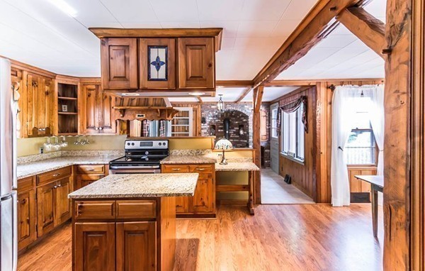 131 Shore Road Sturbridge, MA 01566 - Photo 12 of 29 a kitchen view of a table and chairs in it