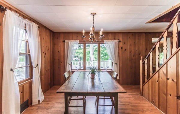 131 Shore Road Sturbridge, MA 01566 - Photo 16 of 29 a view of a dining room with furniture window and wooden floor