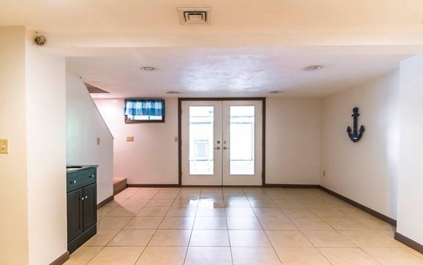 131 Shore Road Sturbridge, MA 01566 - Photo 26 of 29 a view of a livingroom with an empty space and a window