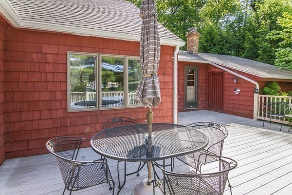 131 Shore Road Sturbridge, MA 01566 - Photo 6 of 29 a backyard of a house with seating space