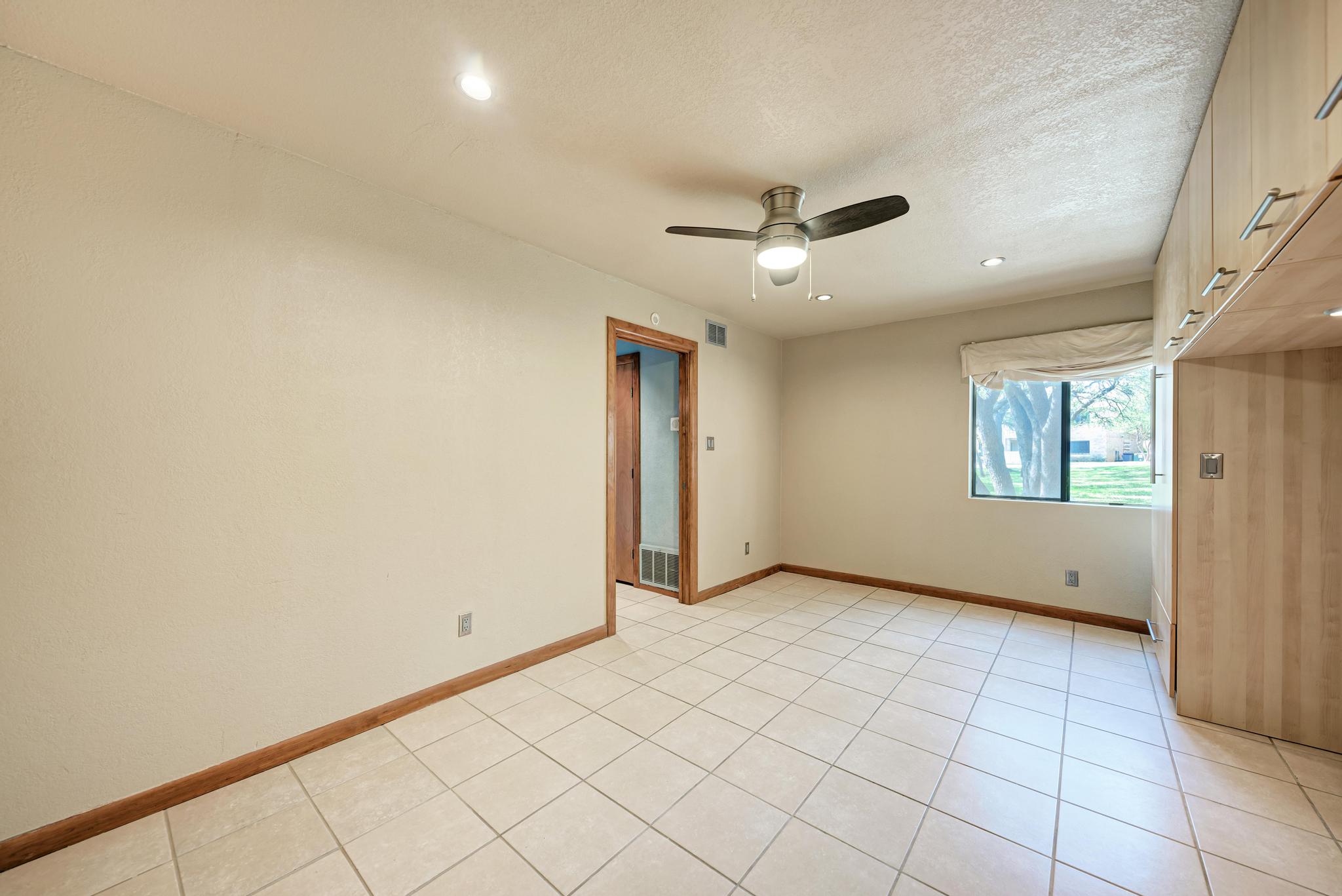 8210 Bent Tree Road, Unit 138 Austin, TX 78759 - Photo 20 of 23 Unfurnished room with a textured ceiling, recessed lighting, a ceiling fan, and light tile patterned flooring