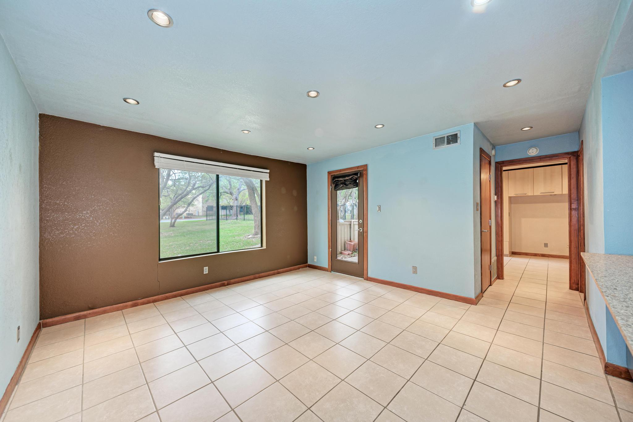 8210 Bent Tree Road, Unit 138 Austin, TX 78759 - Photo 10 of 23 Spare room featuring recessed lighting and light tile patterned floors