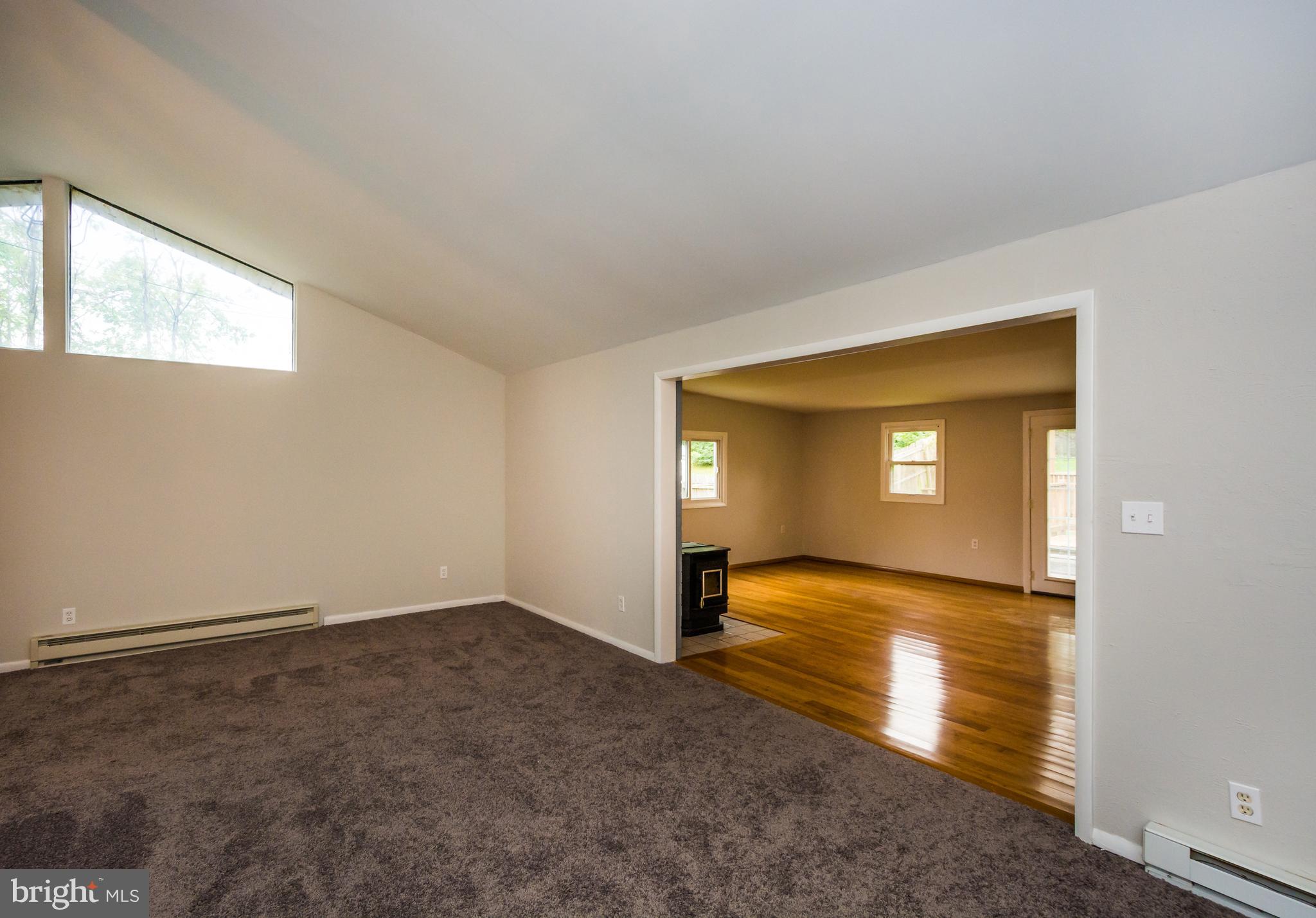 418 Enfield Road Joppa, MD 21085 - Photo 14 of 46 Living room with entry to large family room