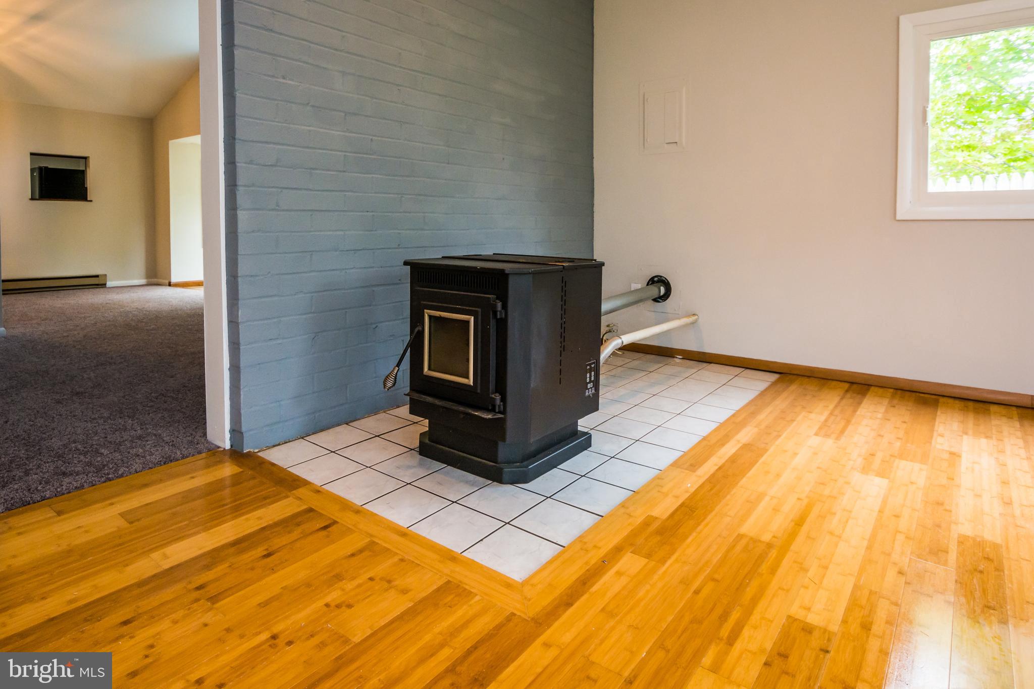 418 Enfield Road Joppa, MD 21085 - Photo 18 of 46 Family room with stove