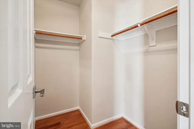 a view of a hallway with a window