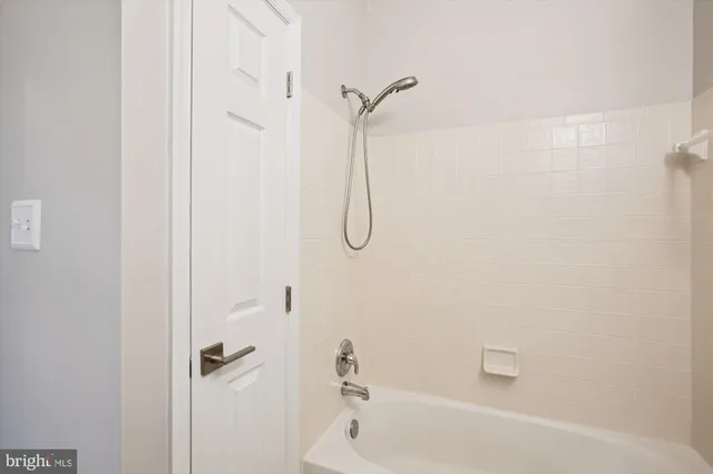 a kitchen with large windows