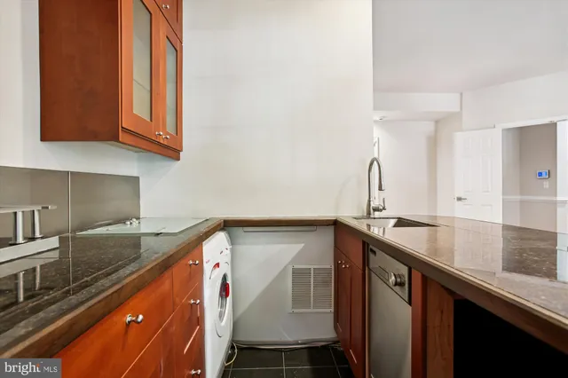 a view of balcony with wooden floor and bench