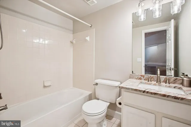 a view of a yard with plants and trees