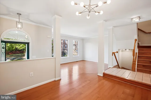 a kitchen with stainless steel appliances a refrigerator and a stove top oven