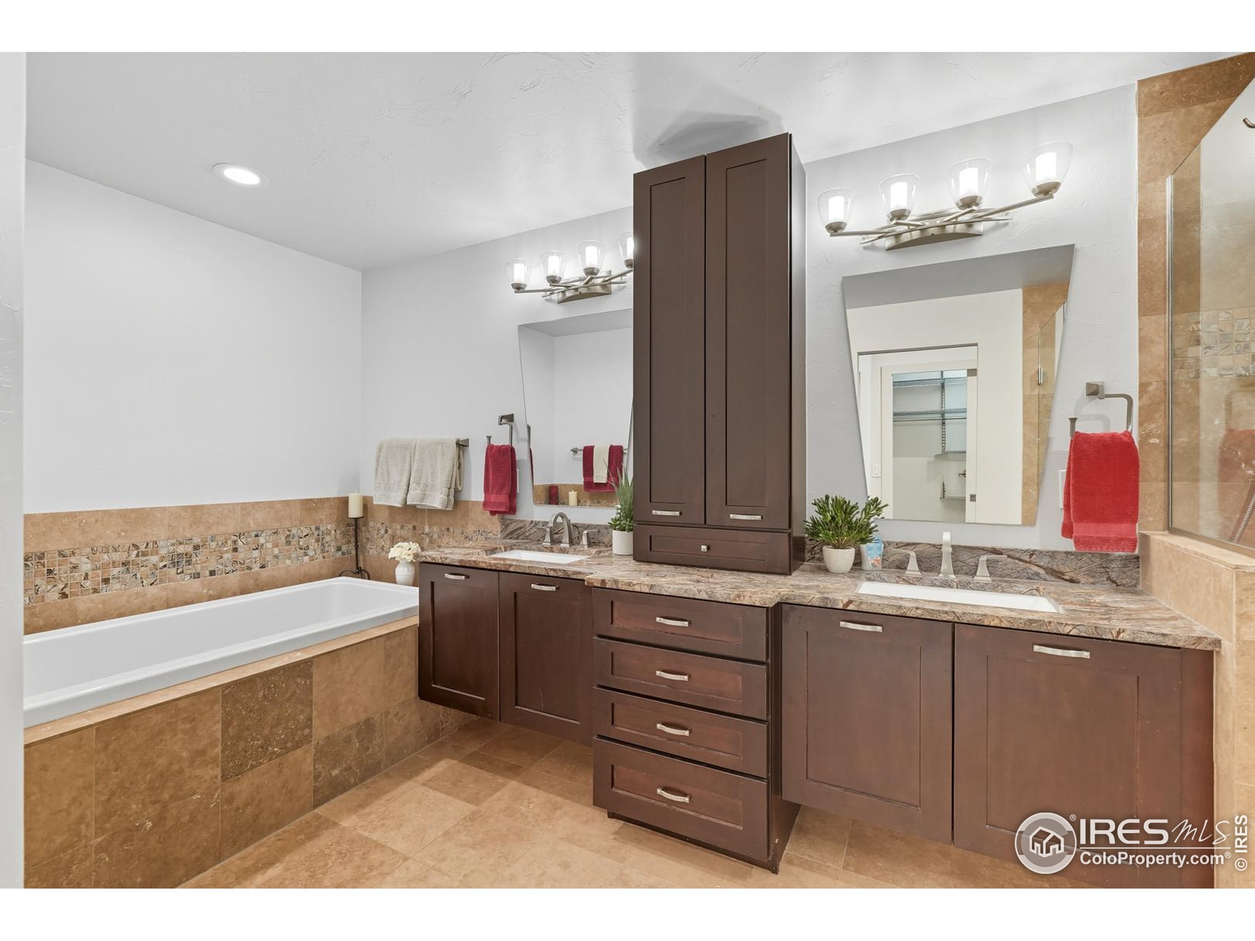 2801 Pennsylvania Avenue, Unit 203 Boulder, CO 80303 - Photo 17 of 50 a bathroom with a sink and a mirror