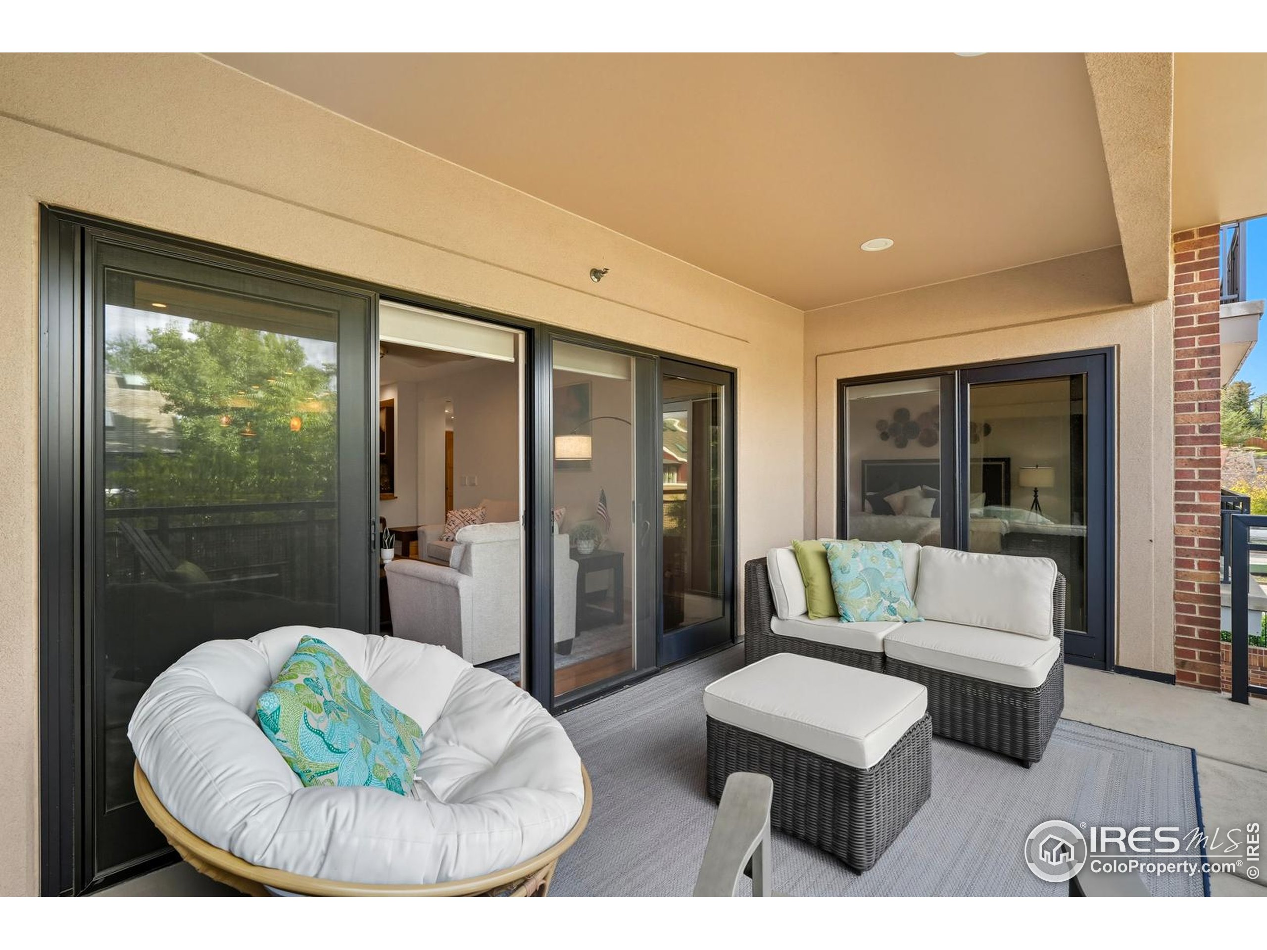 2801 Pennsylvania Avenue, Unit 203 Boulder, CO 80303 - Photo 26 of 50 a living room with furniture and a large window