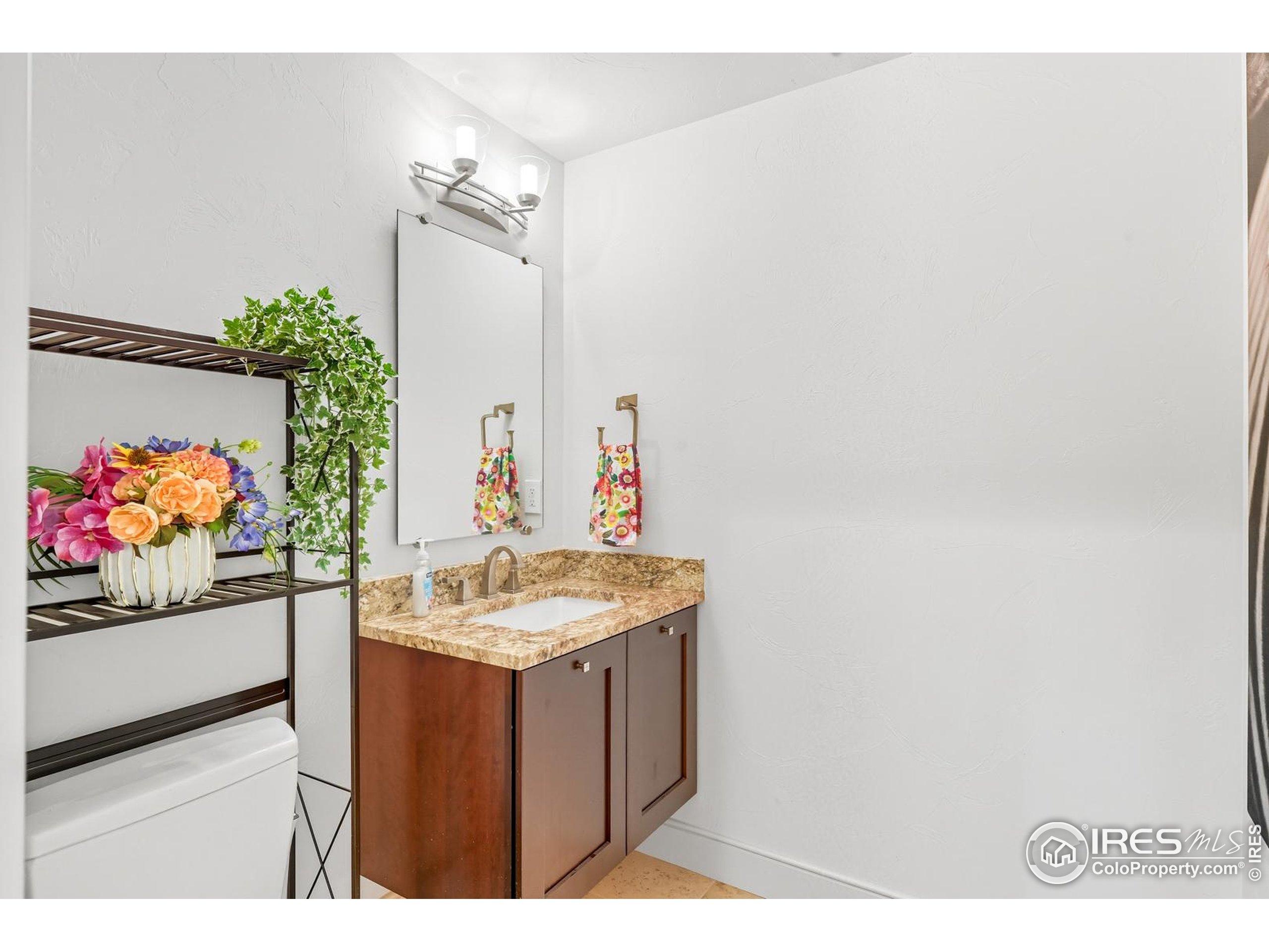 2801 Pennsylvania Avenue, Unit 203 Boulder, CO 80303 - Photo 28 of 50 a bathroom with a sink and a mirror