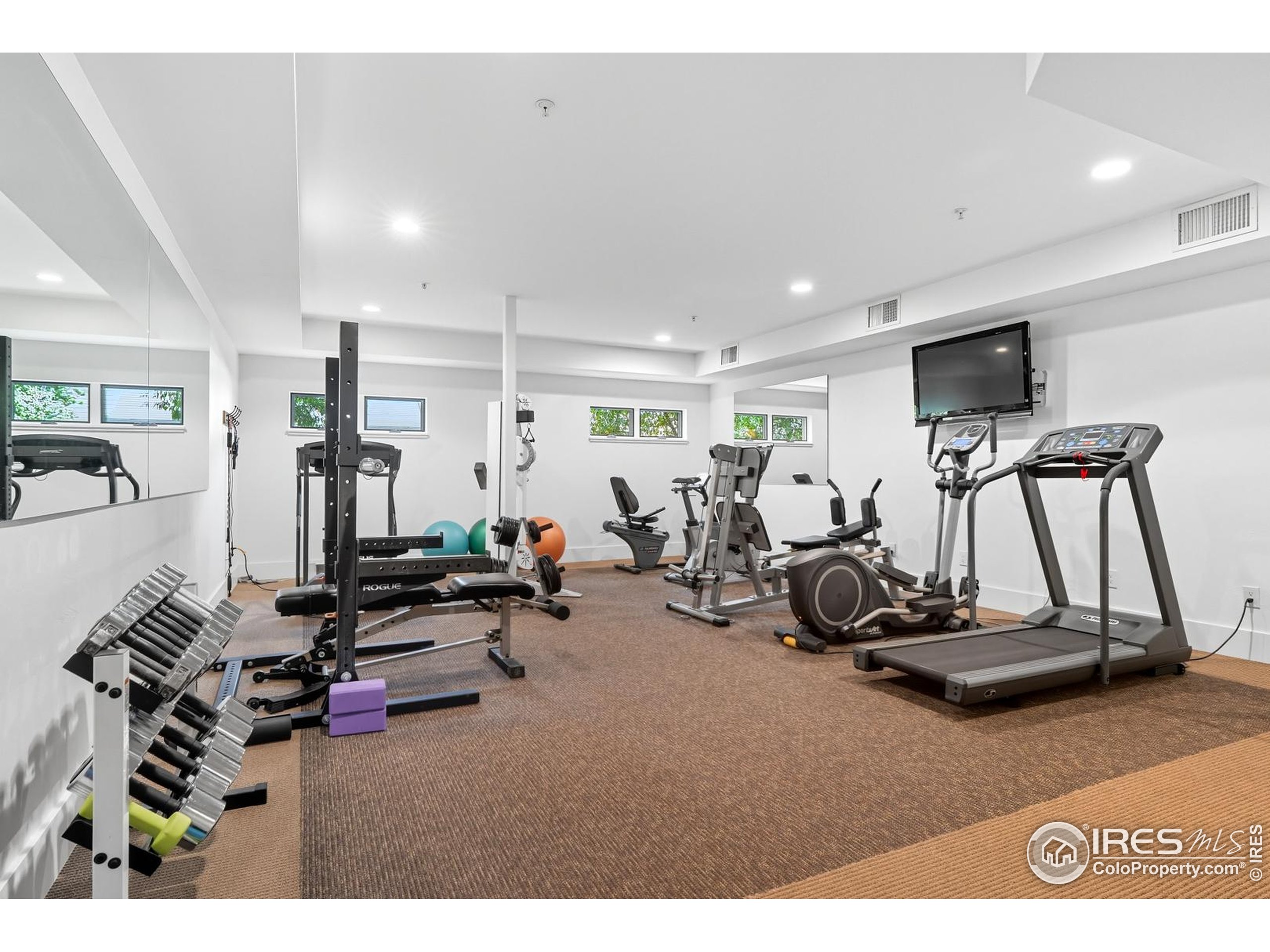 2801 Pennsylvania Avenue, Unit 203 Boulder, CO 80303 - Photo 32 of 50 a view of a room with gym equipment