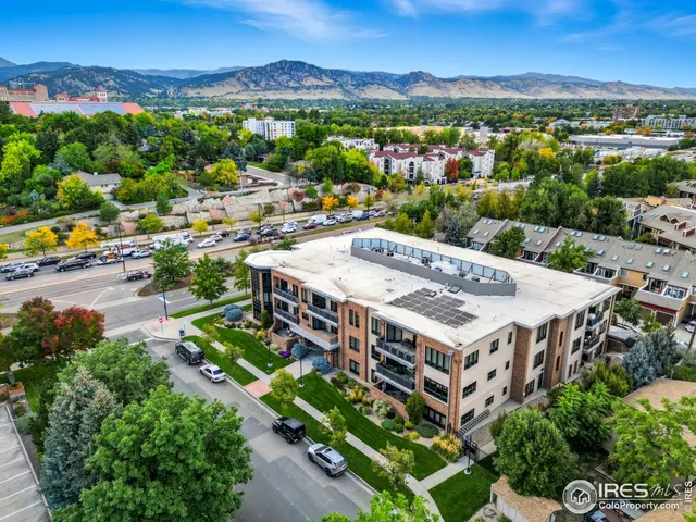 a view of a city with a mountain in the background