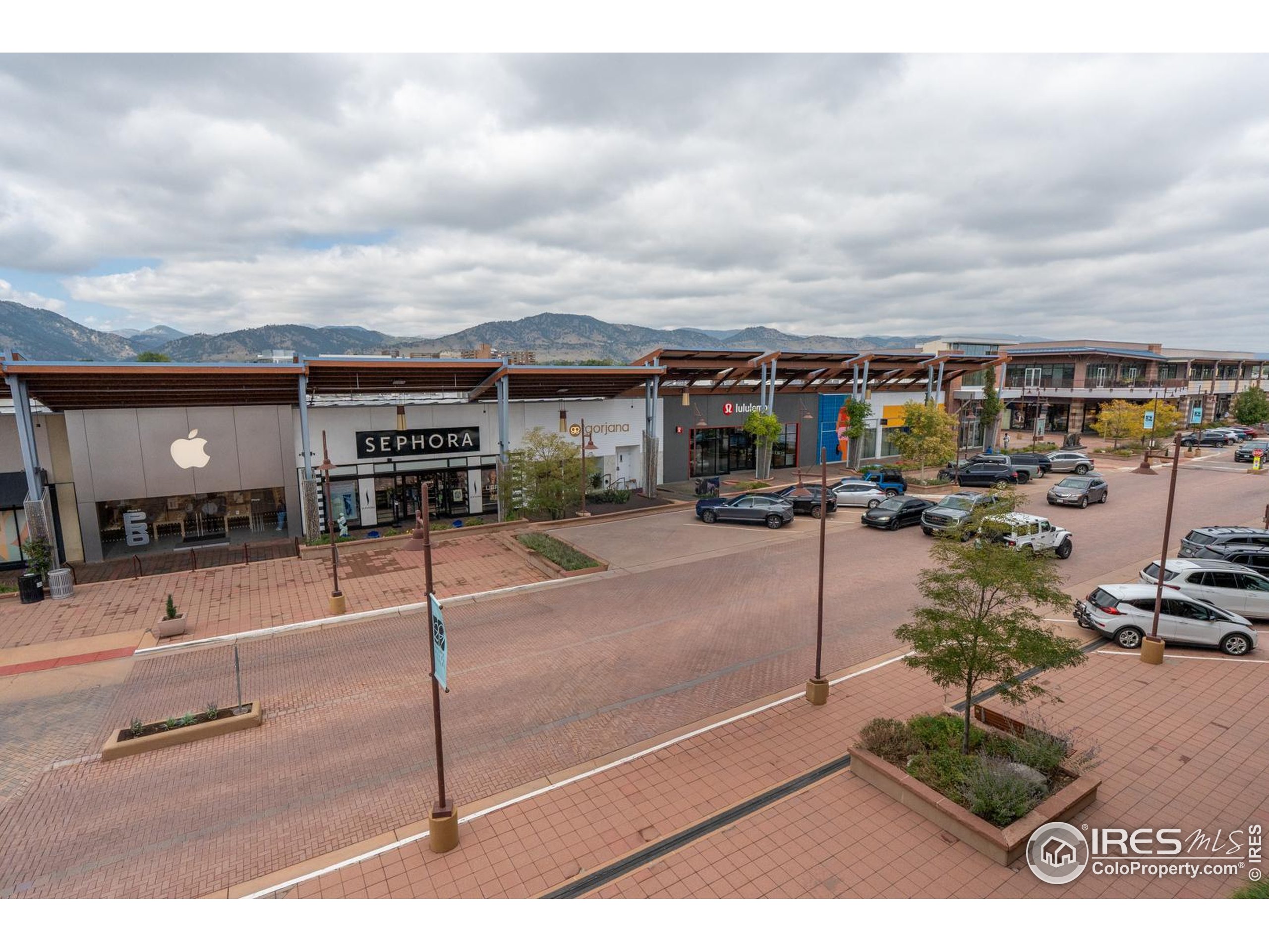 2801 Pennsylvania Avenue, Unit 203 Boulder, CO 80303 - Photo 42 of 50 a view of a terrace with lawn chairs