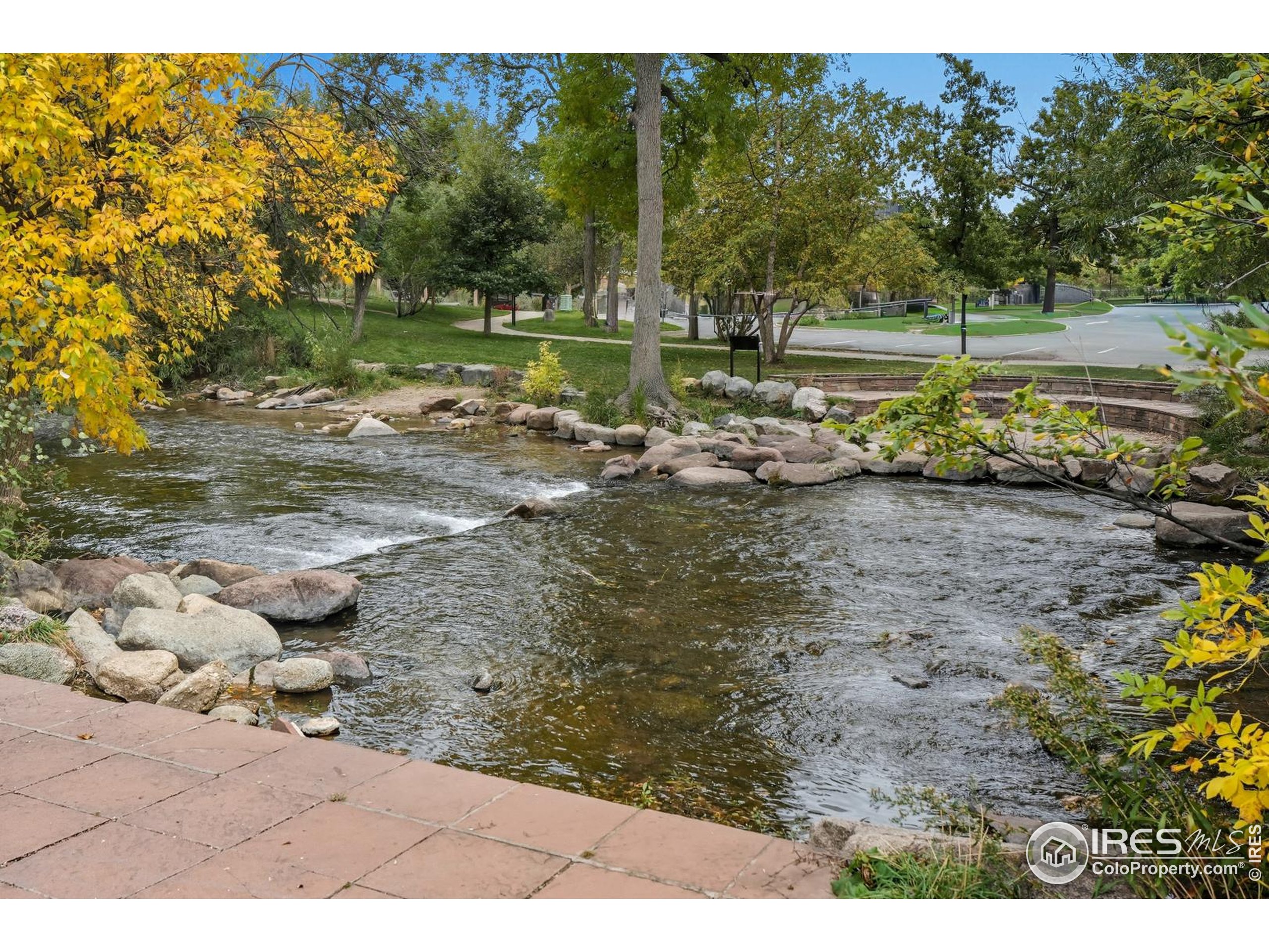 2801 Pennsylvania Avenue, Unit 203 Boulder, CO 80303 - Photo 44 of 50 a view of a yard with wooden fence