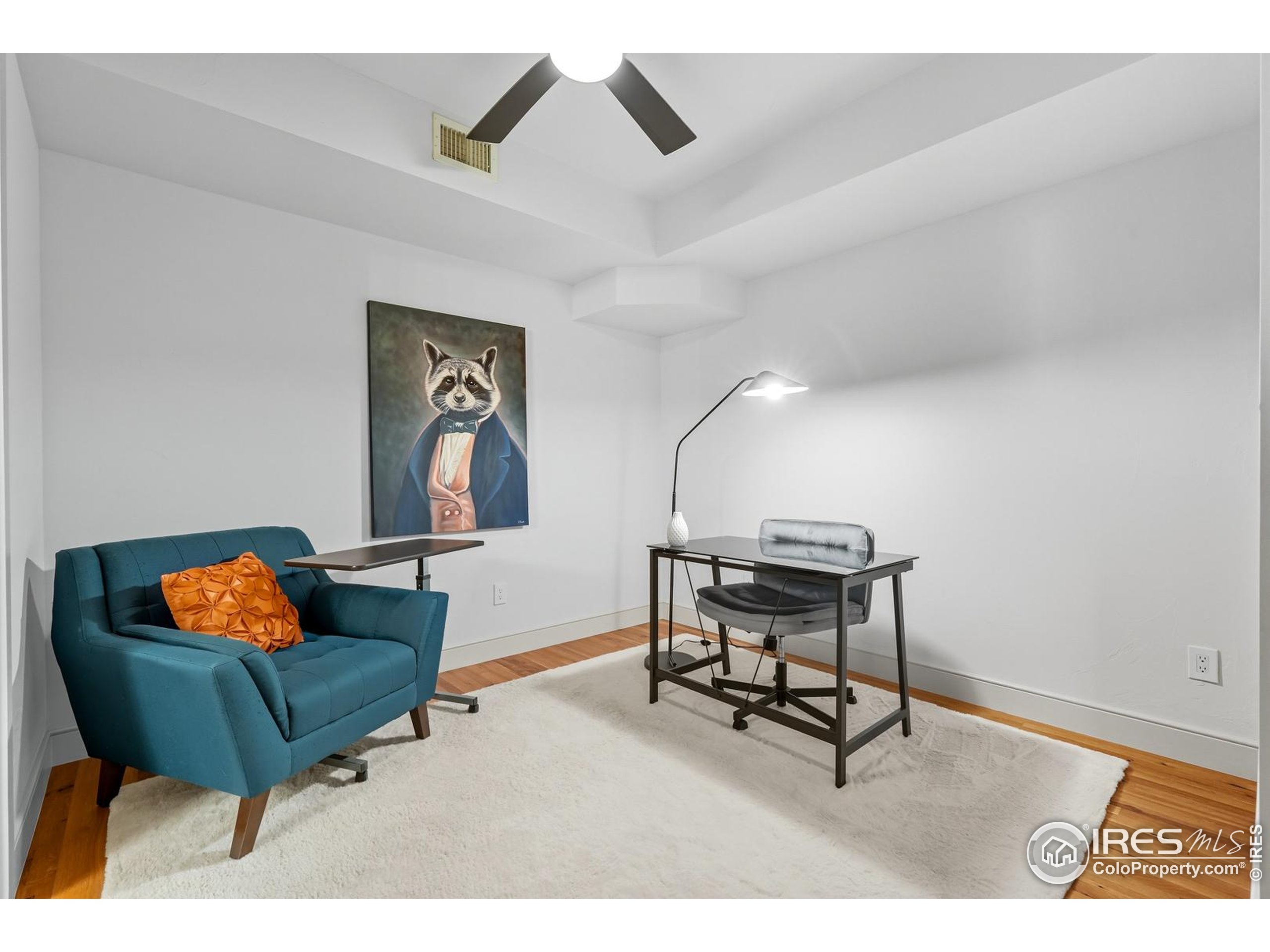 2801 Pennsylvania Avenue, Unit 203 Boulder, CO 80303 - Photo 9 of 50 a living room with furniture and a rug