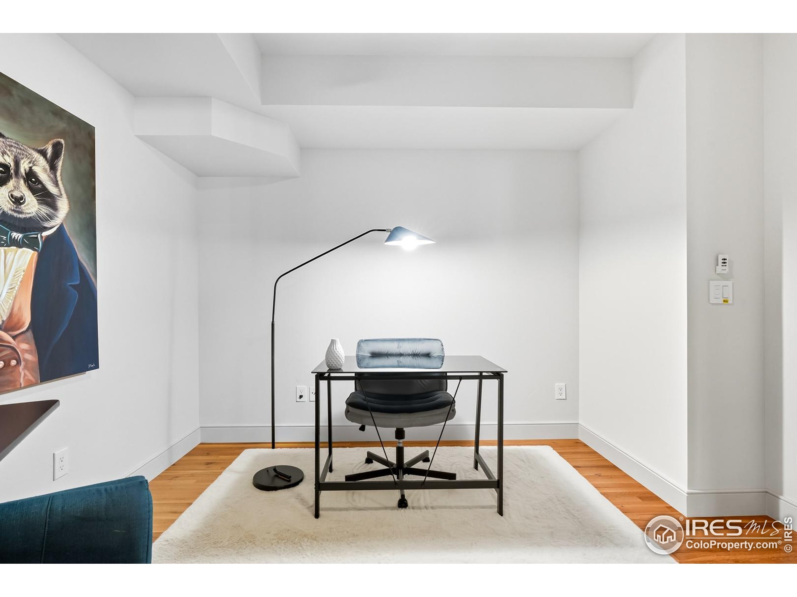2801 Pennsylvania Avenue, Unit 203 Boulder, CO 80303 - Photo 10 of 50 a view of a workspace with furniture and wooden floor
