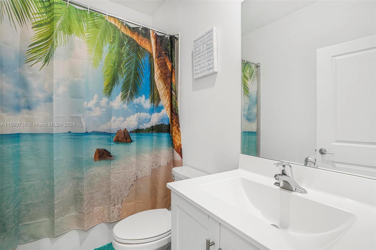 18180 Southwest 148th Road, Unit 18180 Miami, FL 33187 - Photo 15 of 29 a bathroom with a sink toilet and shower