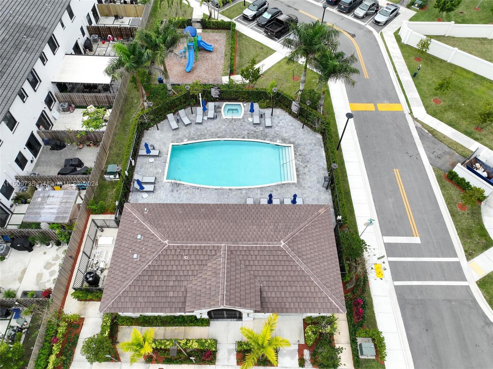18180 Southwest 148th Road, Unit 18180 Miami, FL 33187 - Photo 21 of 29 an aerial view of a house