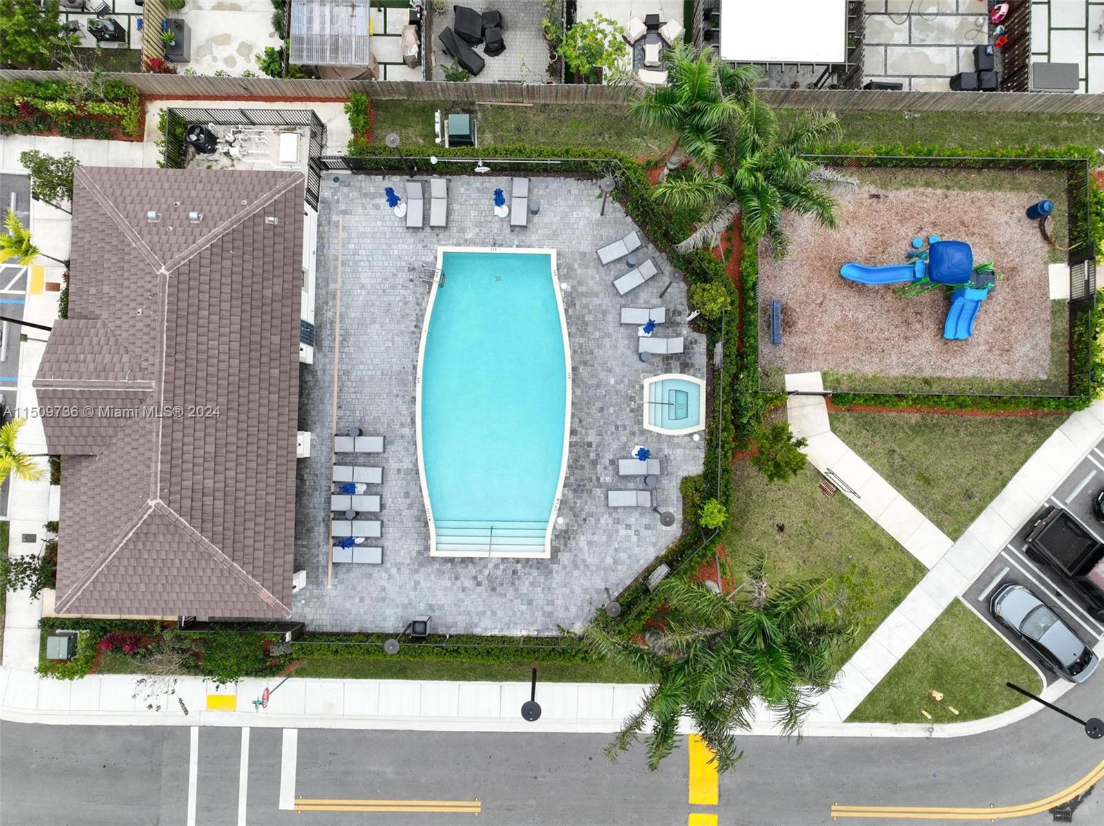 18180 Southwest 148th Road, Unit 18180 Miami, FL 33187 - Photo 22 of 29 an aerial view of a house with a swimming pool