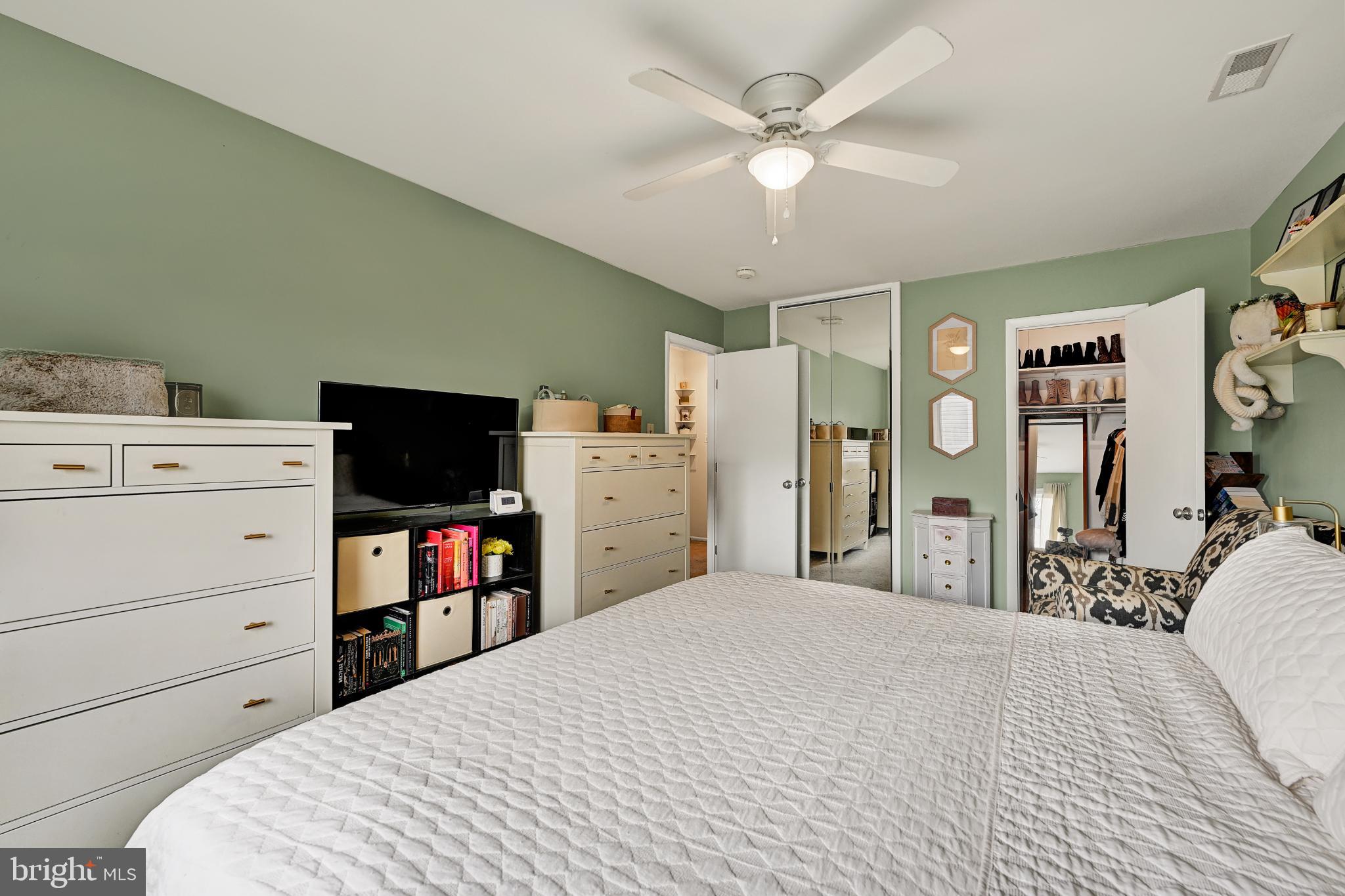 5 Mariners Way, Unit 2 Stevensville, MD 21666 - Photo 13 of 23 Serene bedroom with calming green hues.