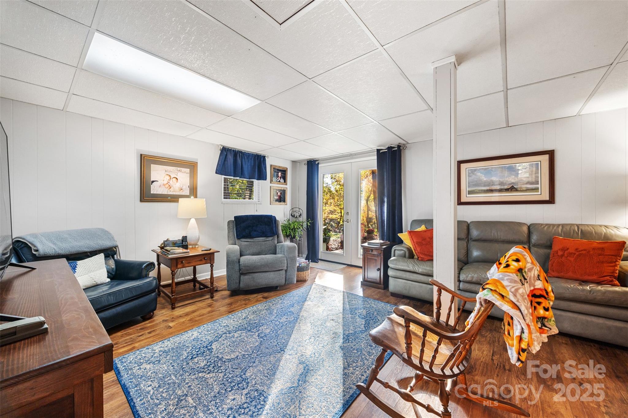 1711 McCombs Street Newton, NC 28658 - Photo 27 of 41 a living room with furniture and wooden floor