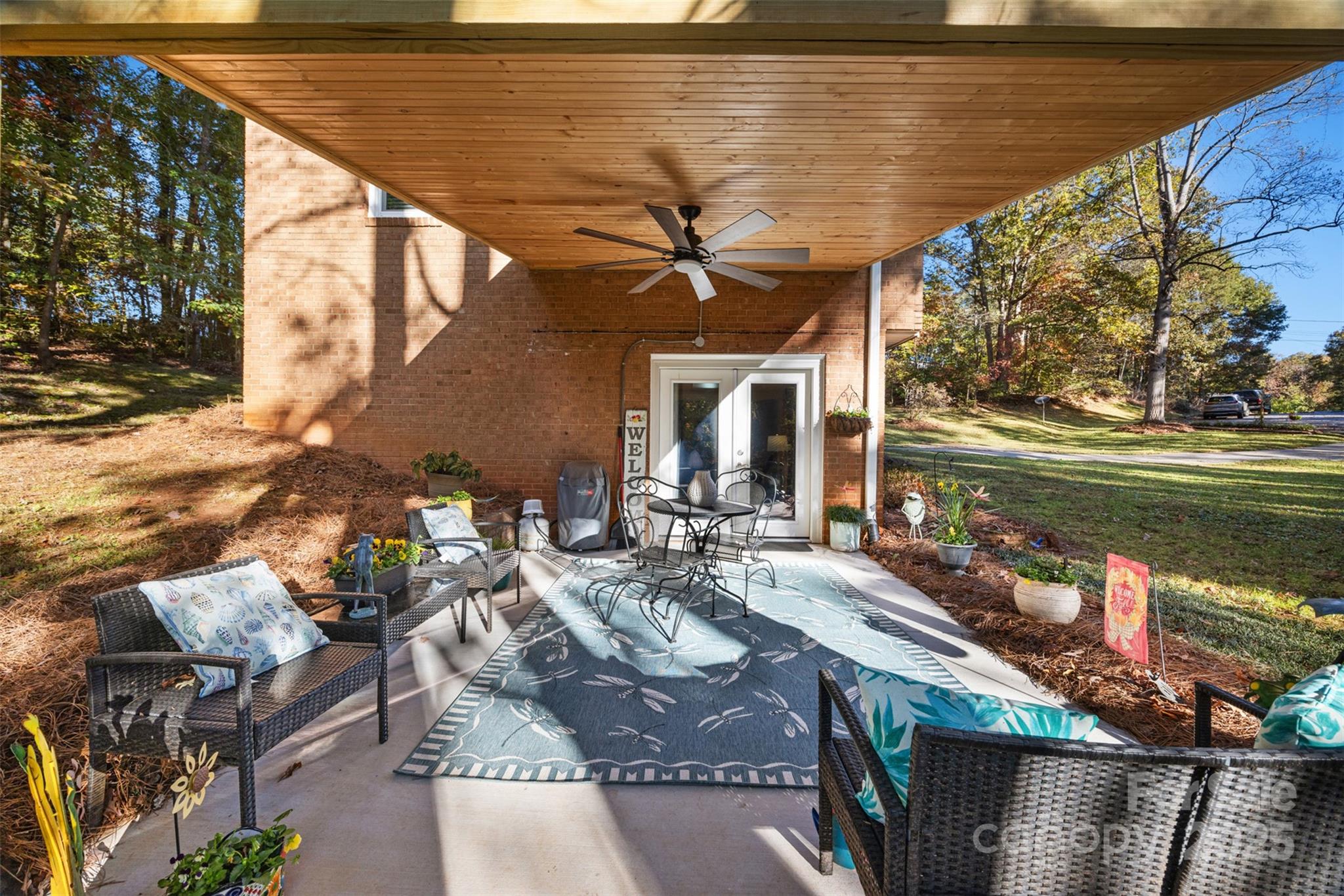 1711 McCombs Street Newton, NC 28658 - Photo 34 of 41 a view of a chairs and table in the patio
