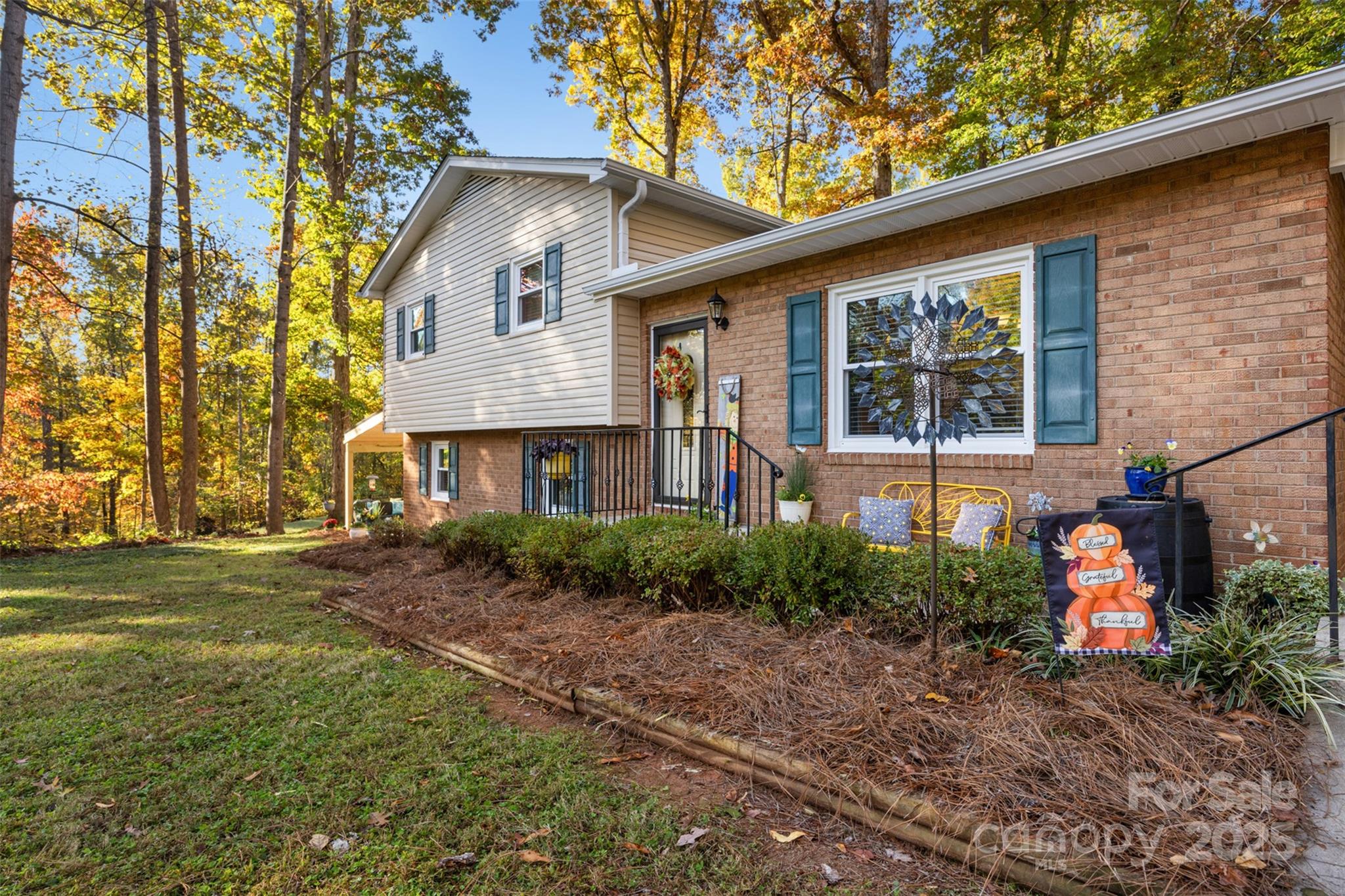 1711 McCombs Street Newton, NC 28658 - Photo 4 of 41 a front view of a house with garden