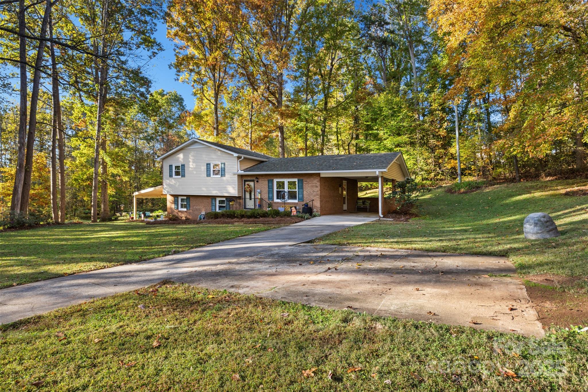 1711 McCombs Street Newton, NC 28658 - Photo 6 of 41 a front view of a house with a yard