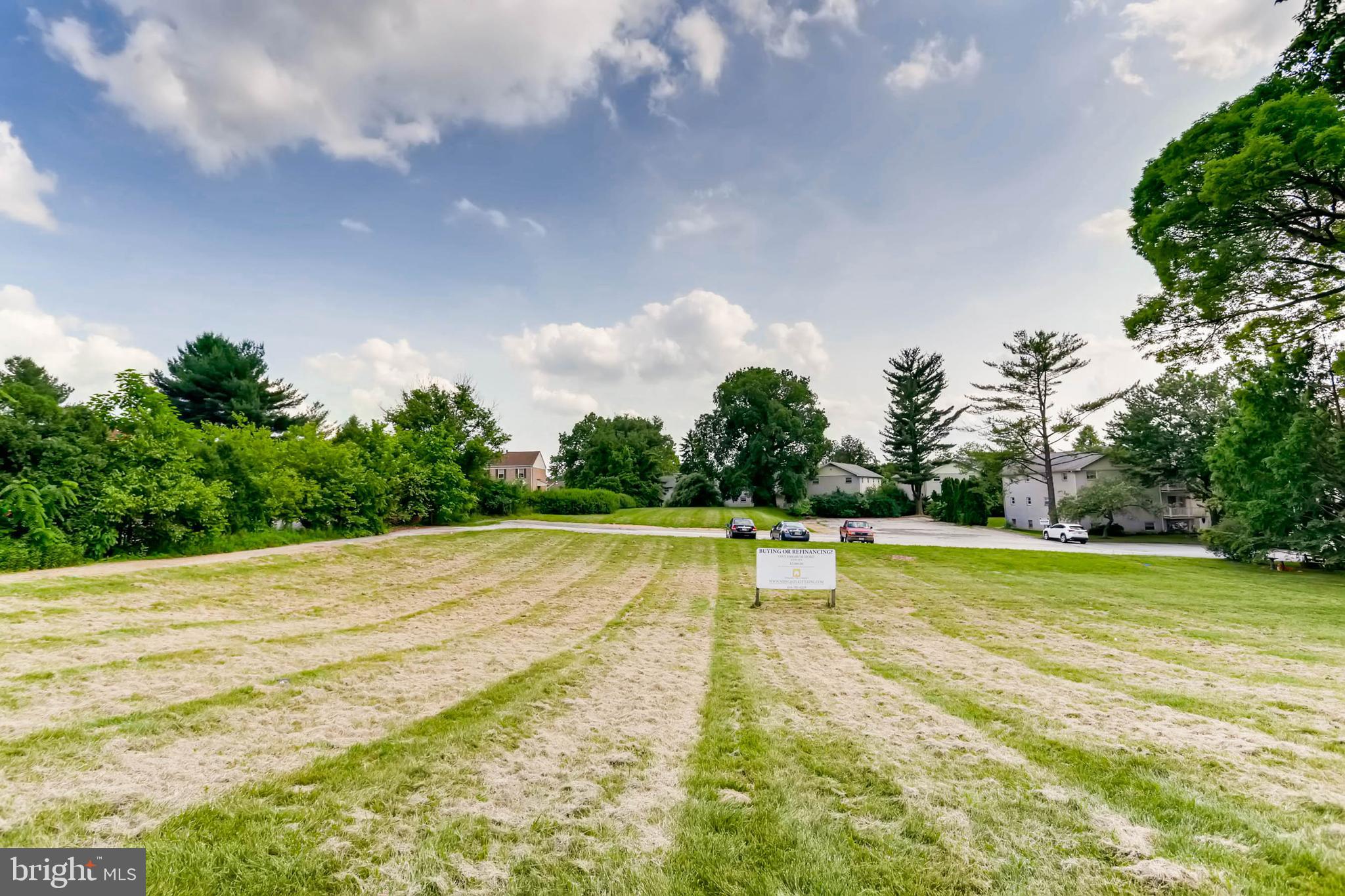 a view of a swimming pool with an outdoor space and seating area