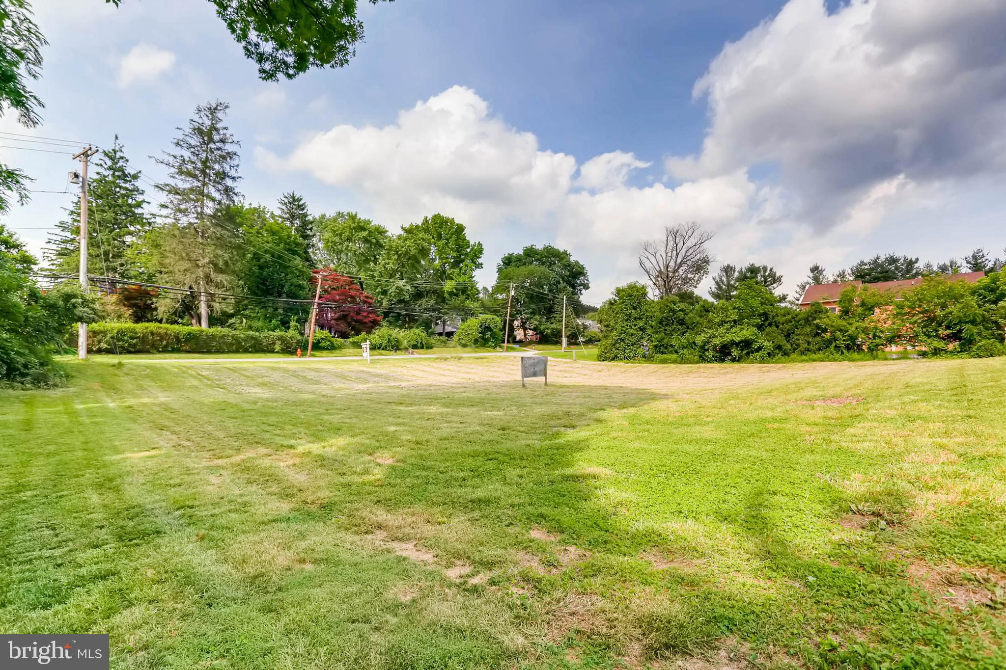 Warren Road Hunt Valley, MD 21030 - Photo 4 of 11 a view of outdoor space with swimming pool and green space