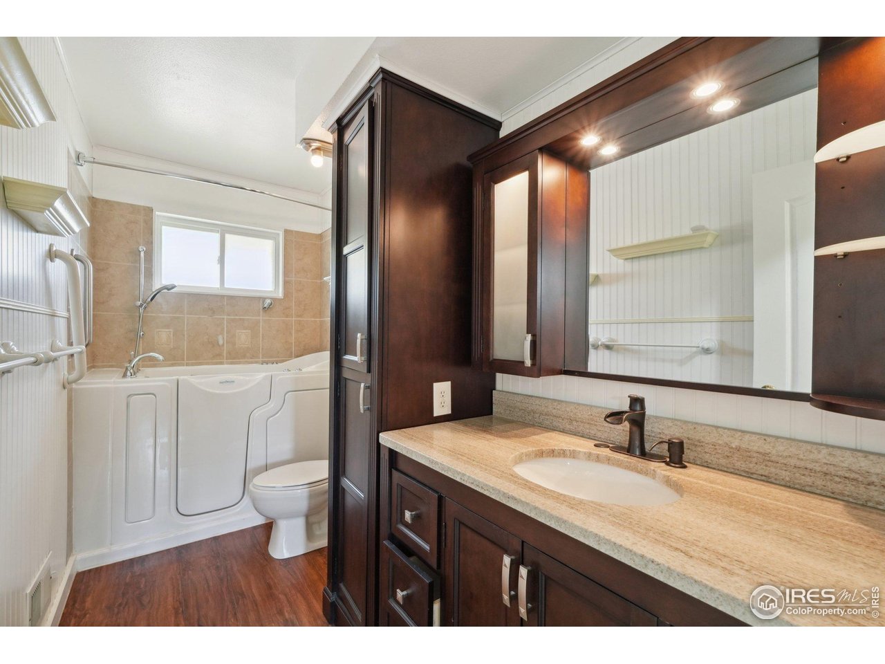 2001 Evergreen Drive Fort Collins, CO 80521 - Photo 16 of 39 a bathroom with a granite countertop sink toilet and shower