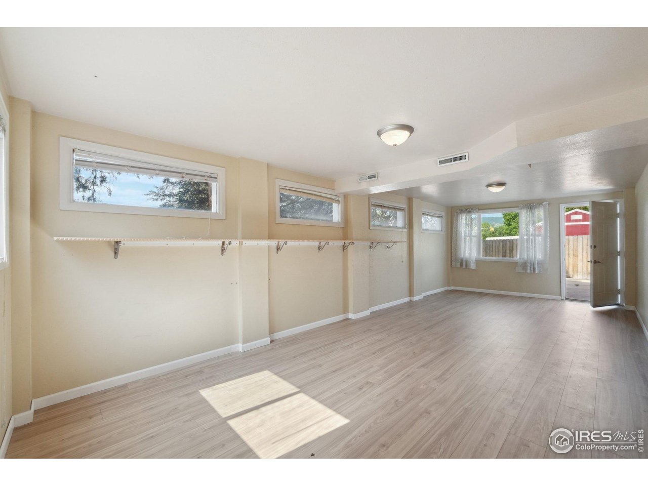2001 Evergreen Drive Fort Collins, CO 80521 - Photo 20 of 39 a view interior of a house wooden floor and windows
