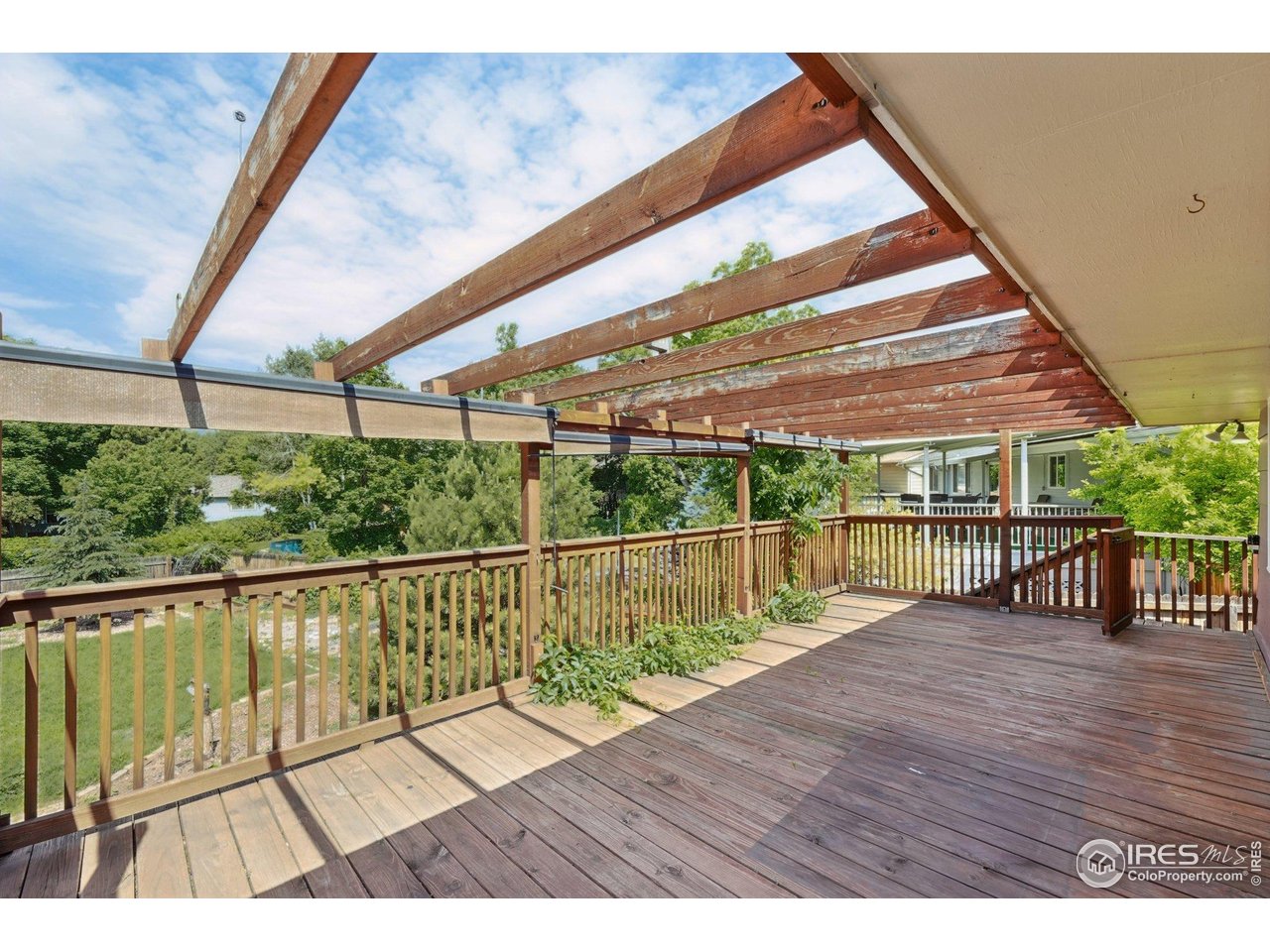 2001 Evergreen Drive Fort Collins, CO 80521 - Photo 35 of 39 a view of balcony with wooden floor